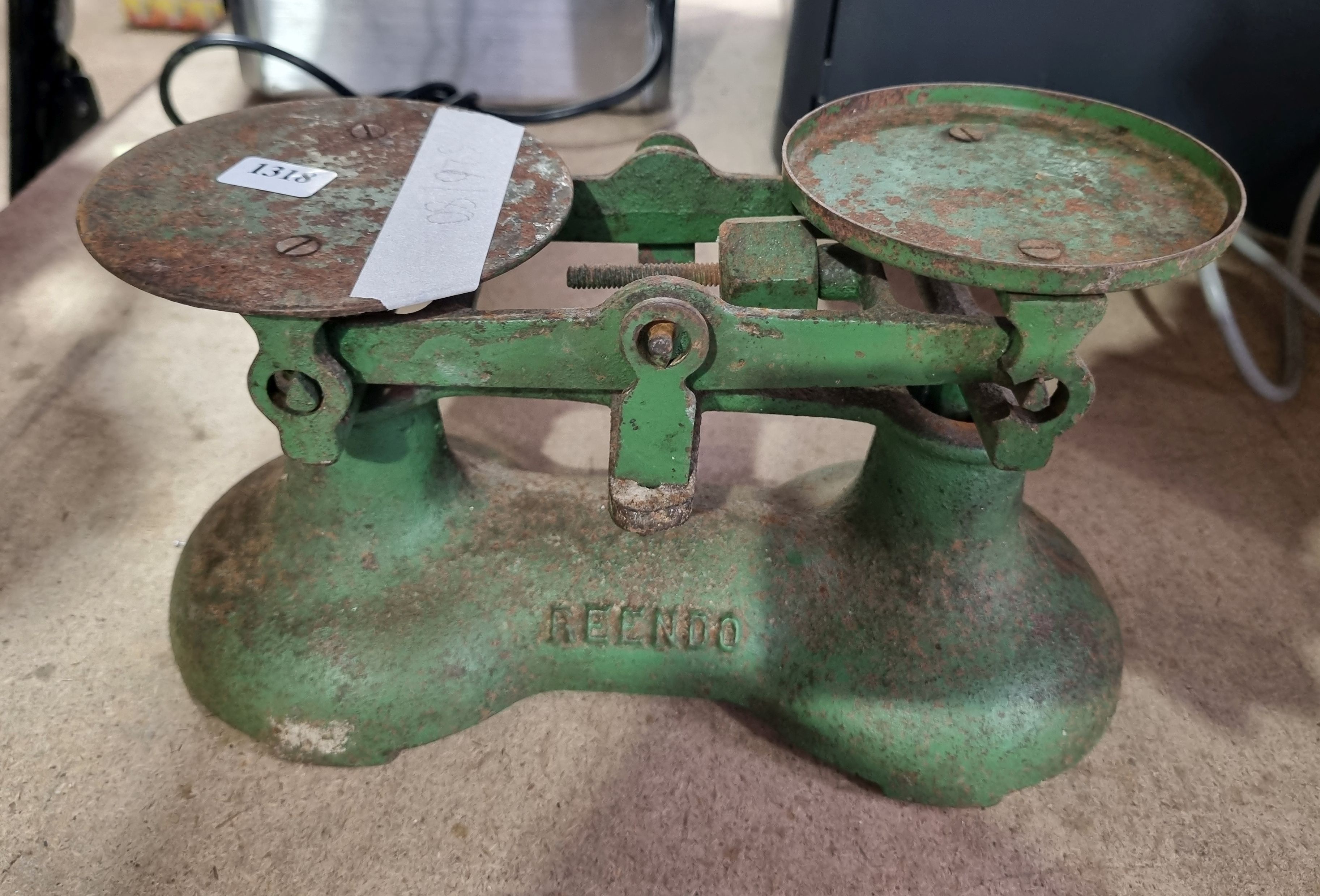 A Set Of Vintage Reendo Cast Iron Scales