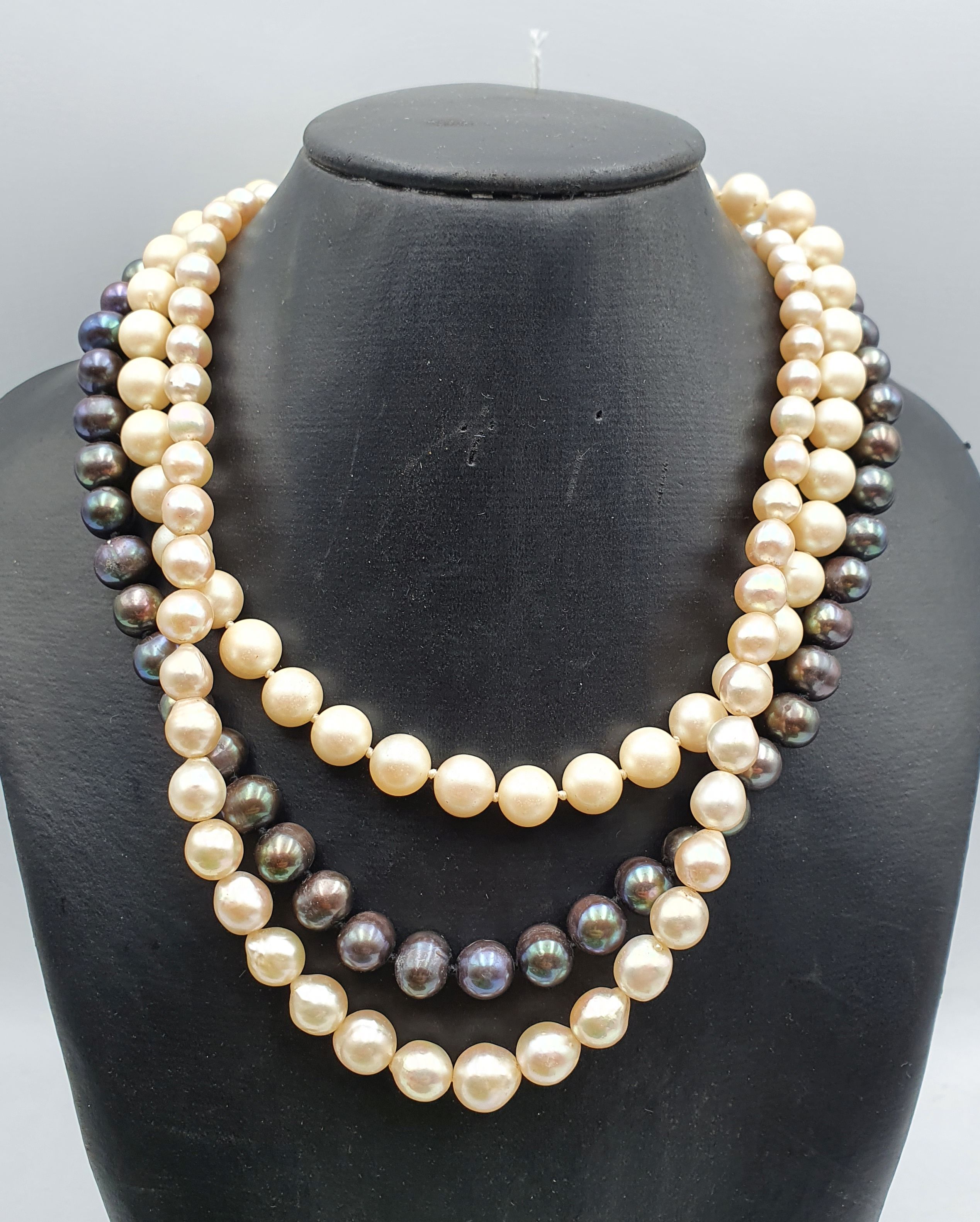 269 · THREE PEARL NECKLACES