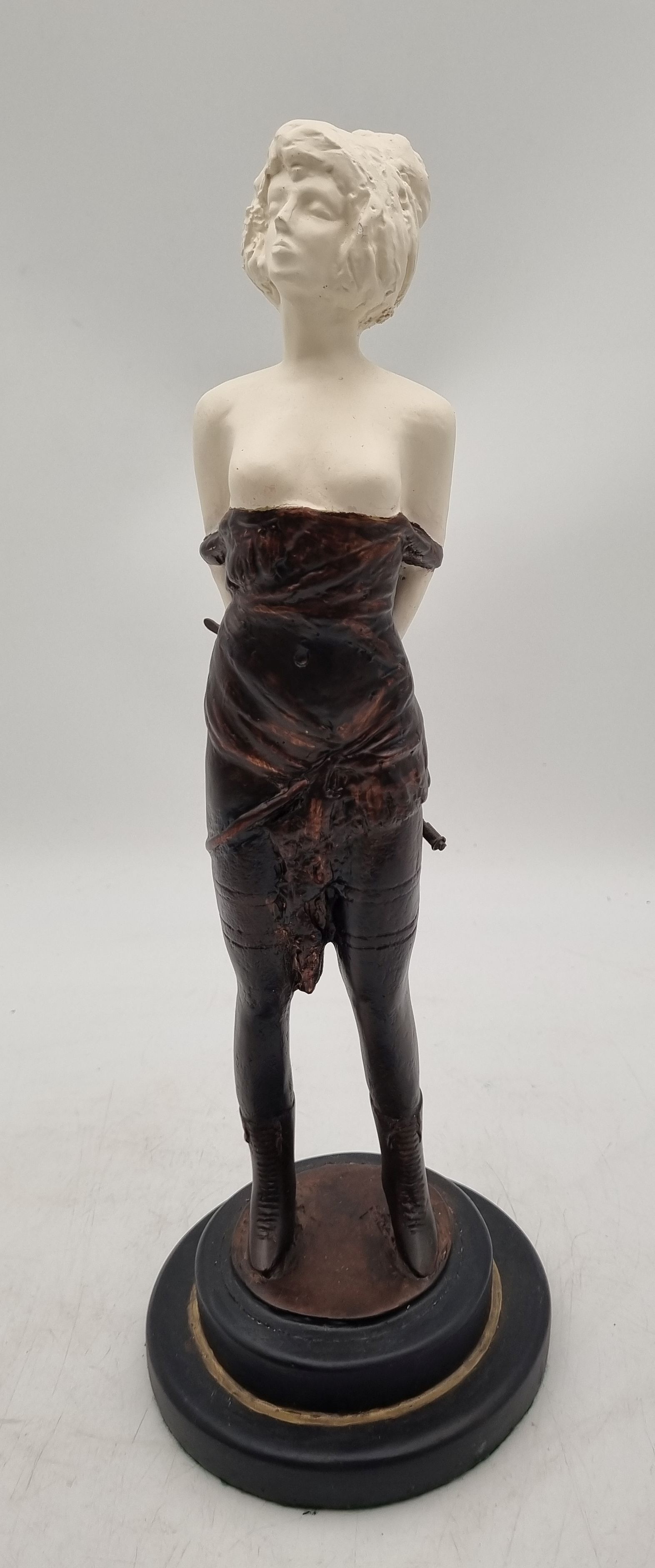 705 · AN ART DECO STYLE COMPOSITE FIGURE OF A LADY