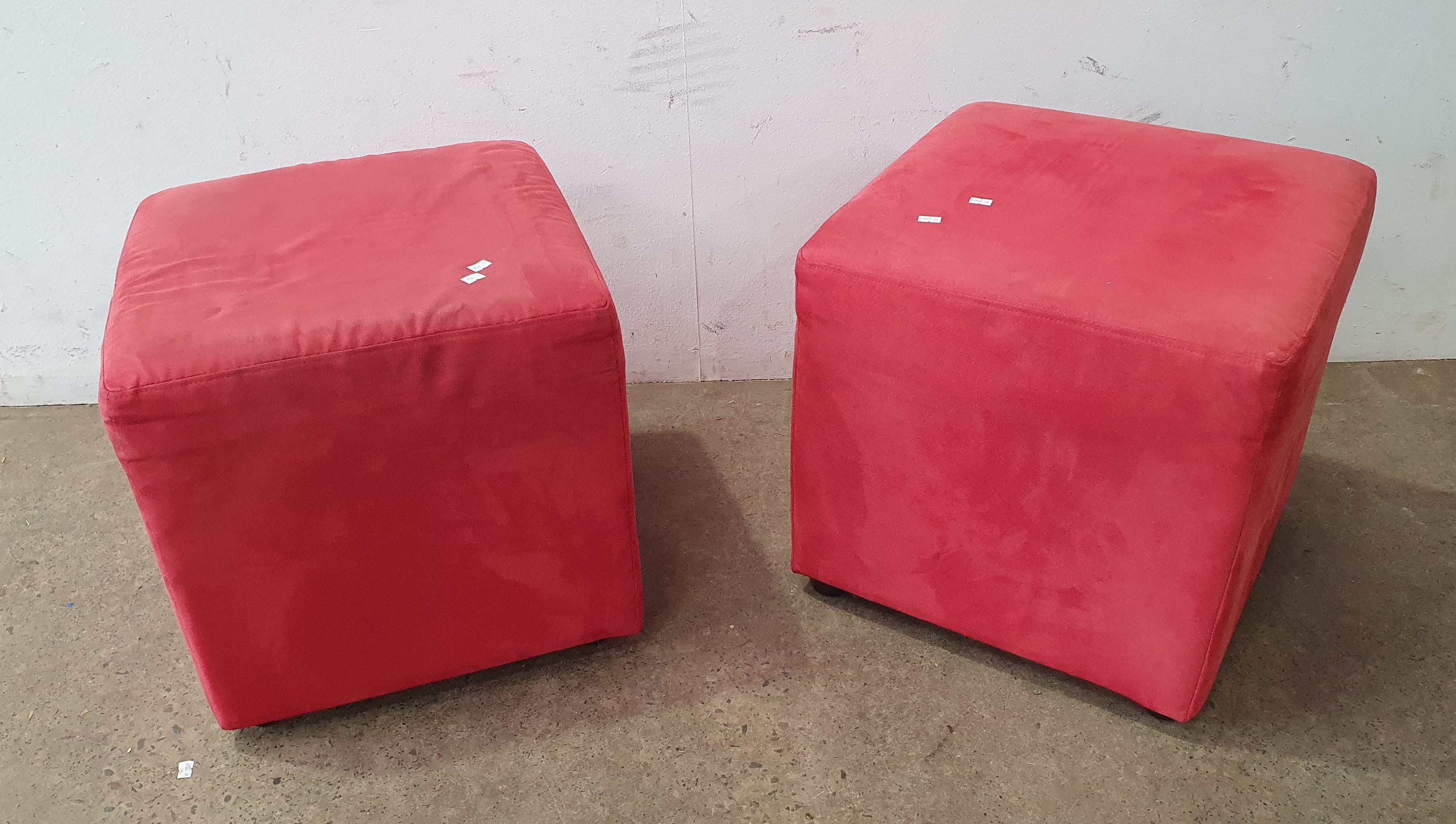 Two Pink Ottomans