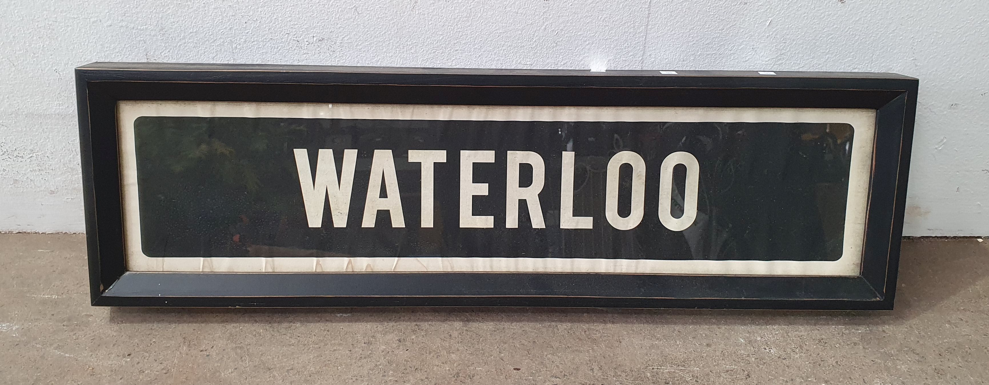 A REPRODUCTION WATERLOO FRAMED SIGN