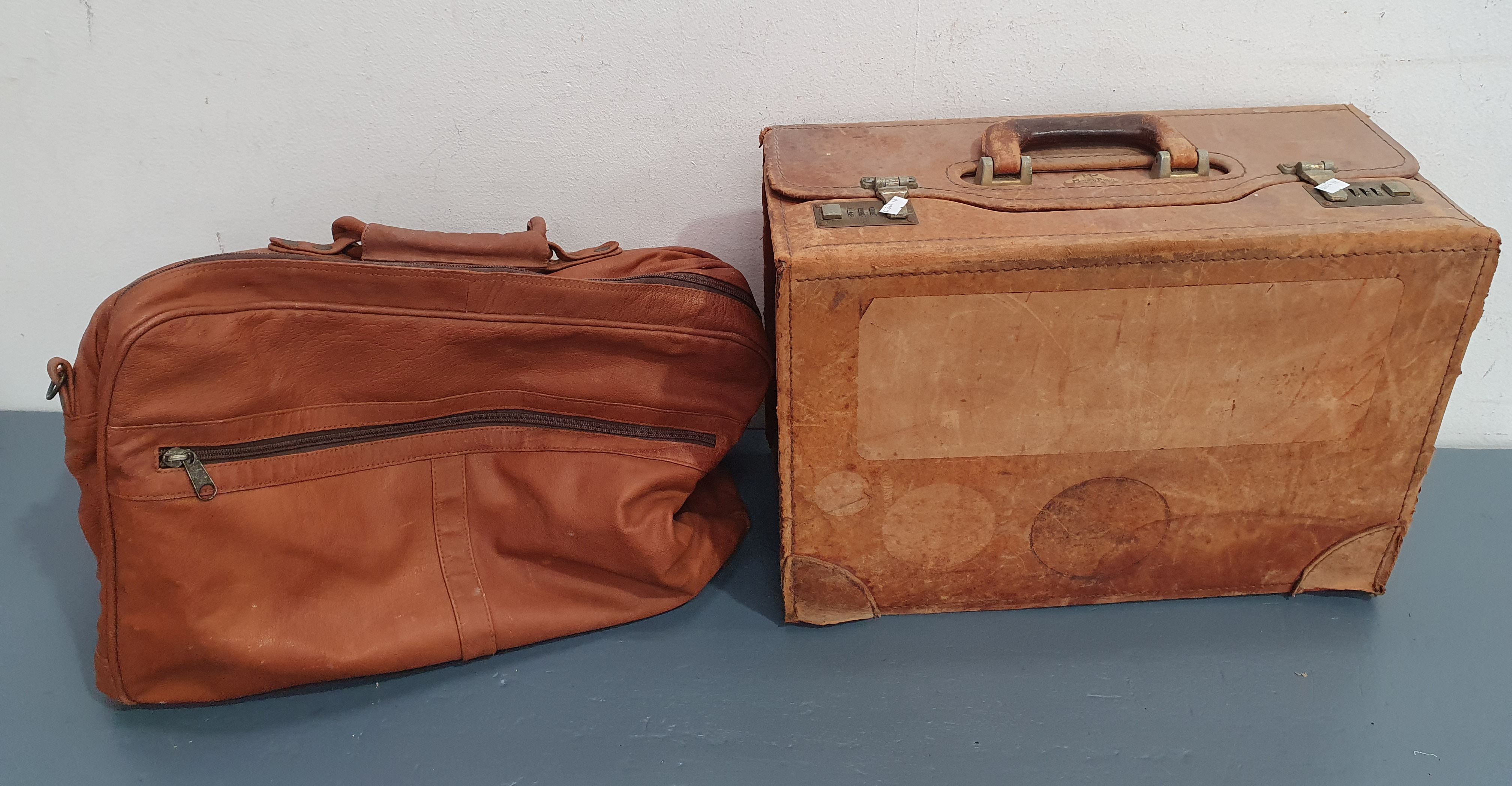 A Leather Marco Polo Suitcase