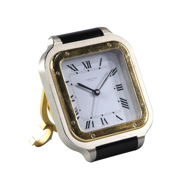 French Santos de Cartier desk clock, designed after the Panthere  wristwatch,  having a two tone case accented with black  lacquer,...