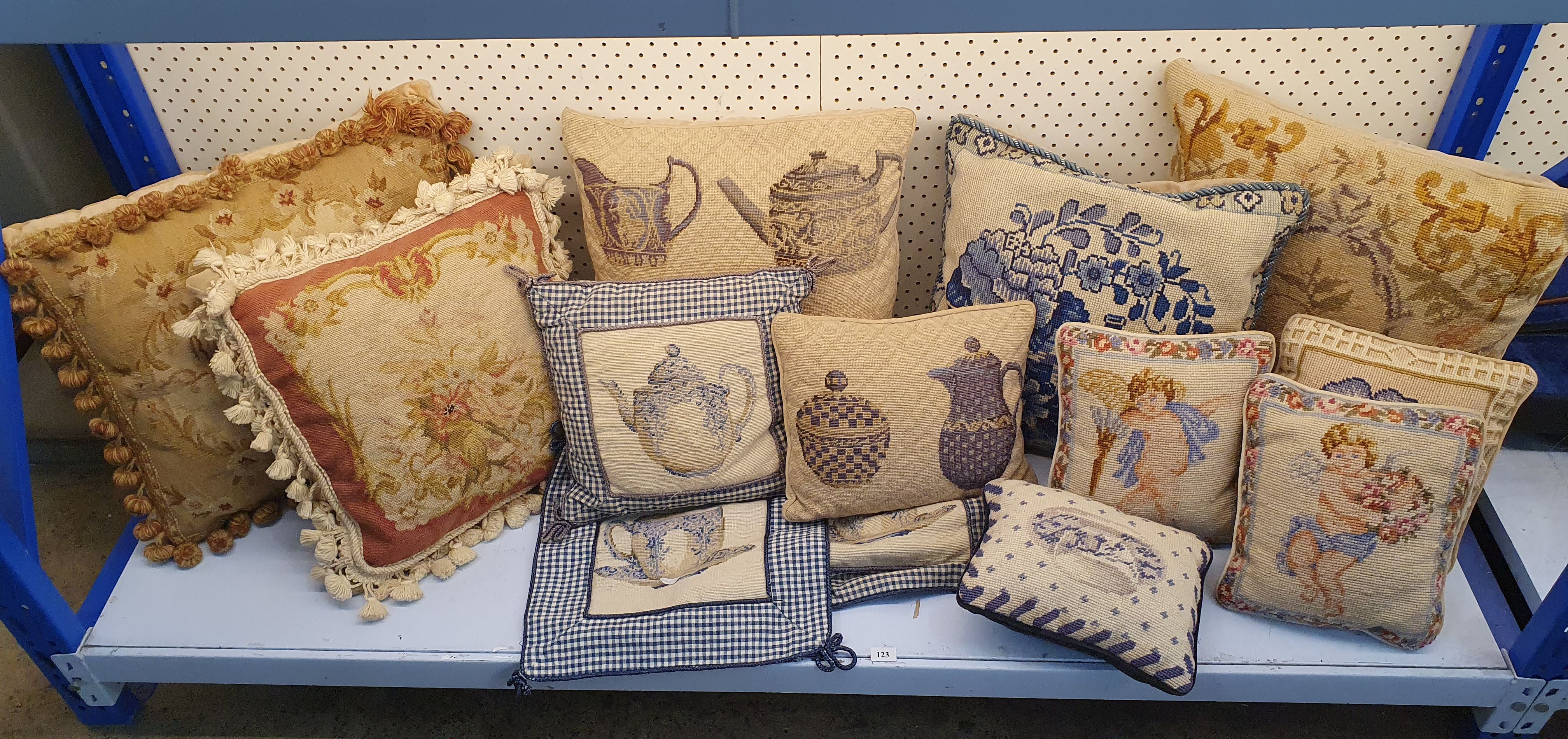 123 · A SELECTION OF HANDSTITCHED TAPESTRY CUSHIONS WITH VELVET BACKING