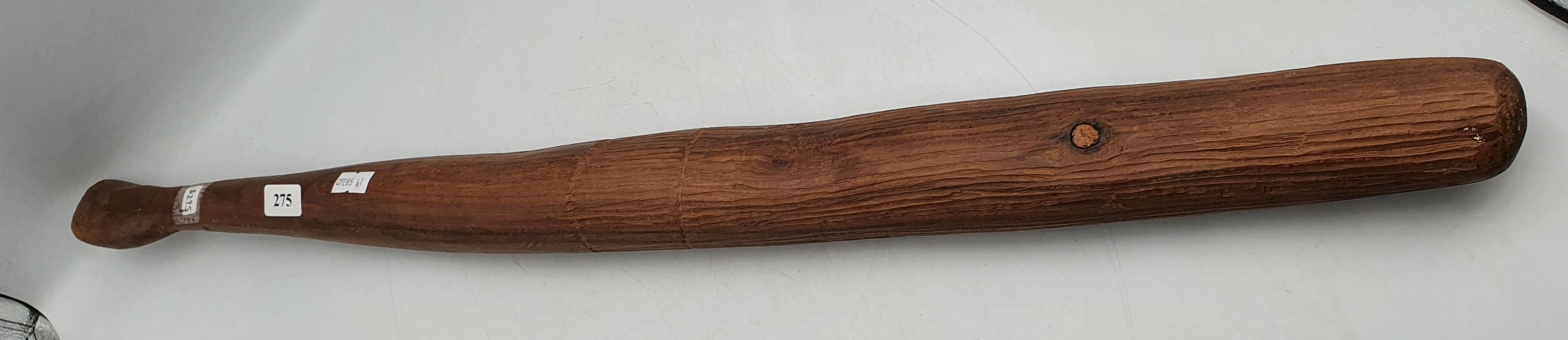183 · A TRIBAL CARVED TIMBER HUNTING WEAPON