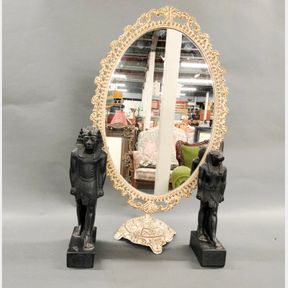 Two Egyptian stone resin figures, H. 32cm. One A/F. With a vintage painted metal dressing table mirror, H. 60cm.