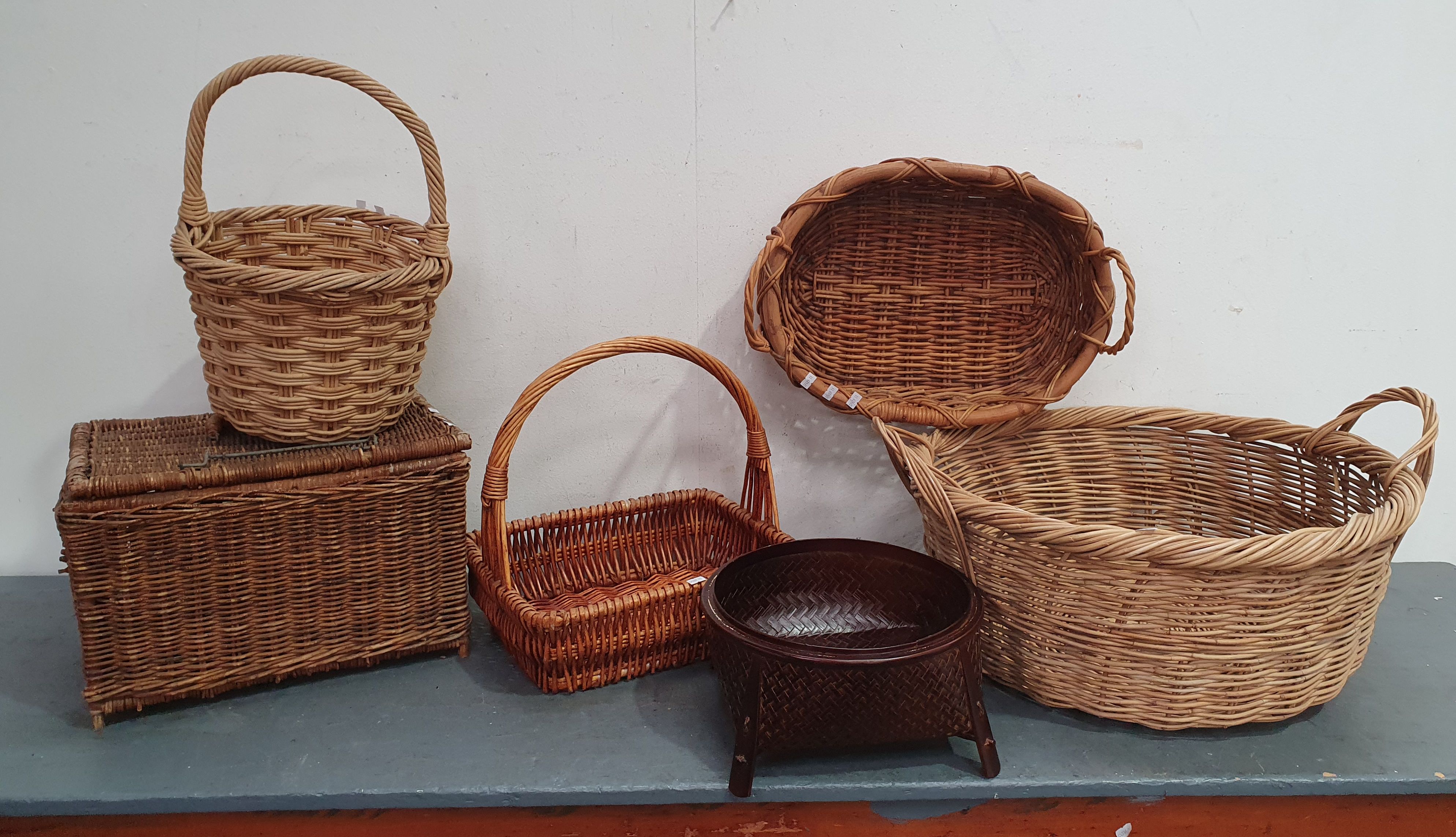 1188 · A GROUP OF CANE BASKETS