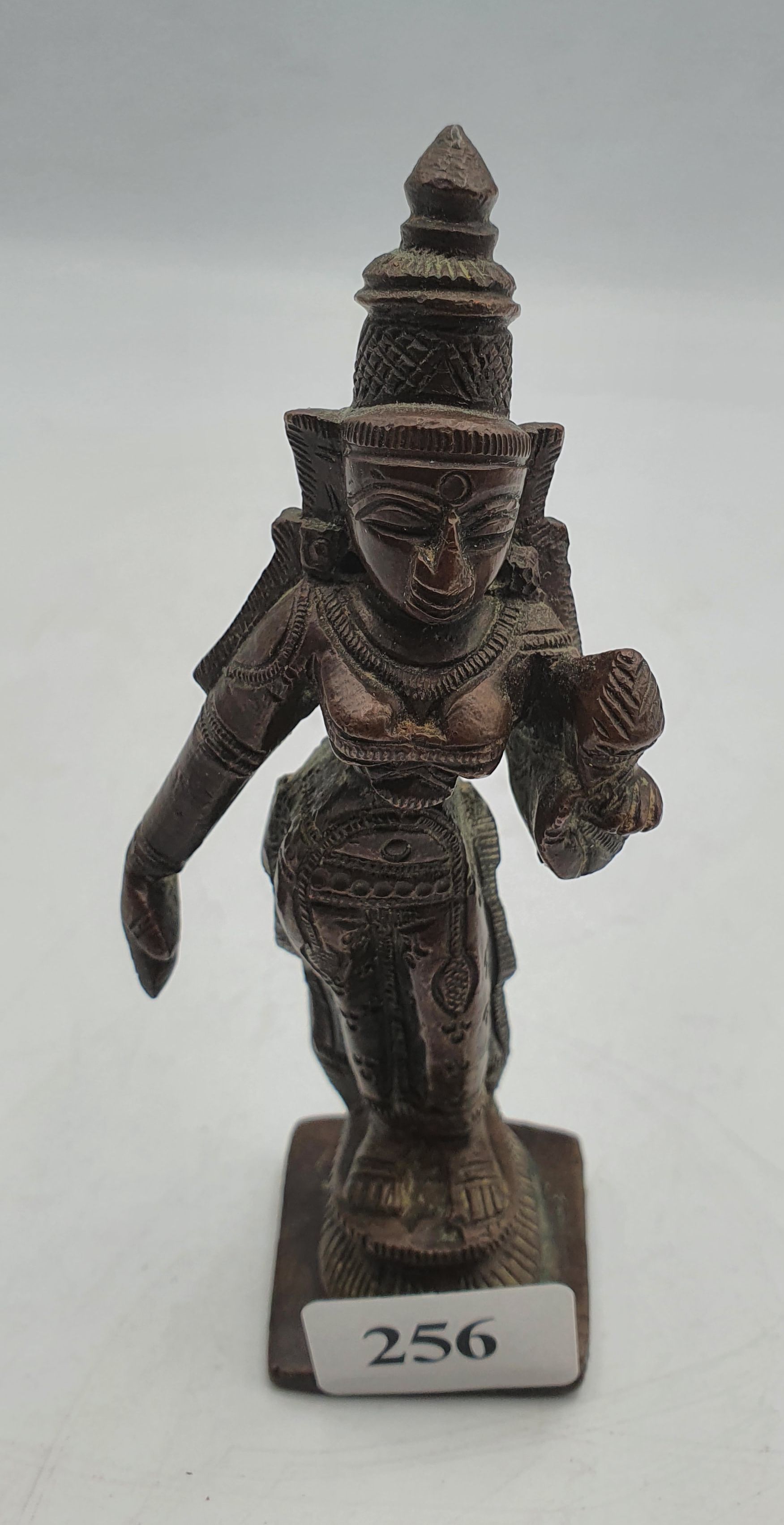 A SMALL 19th CENTURY INDIAN BRONZE FIGURE