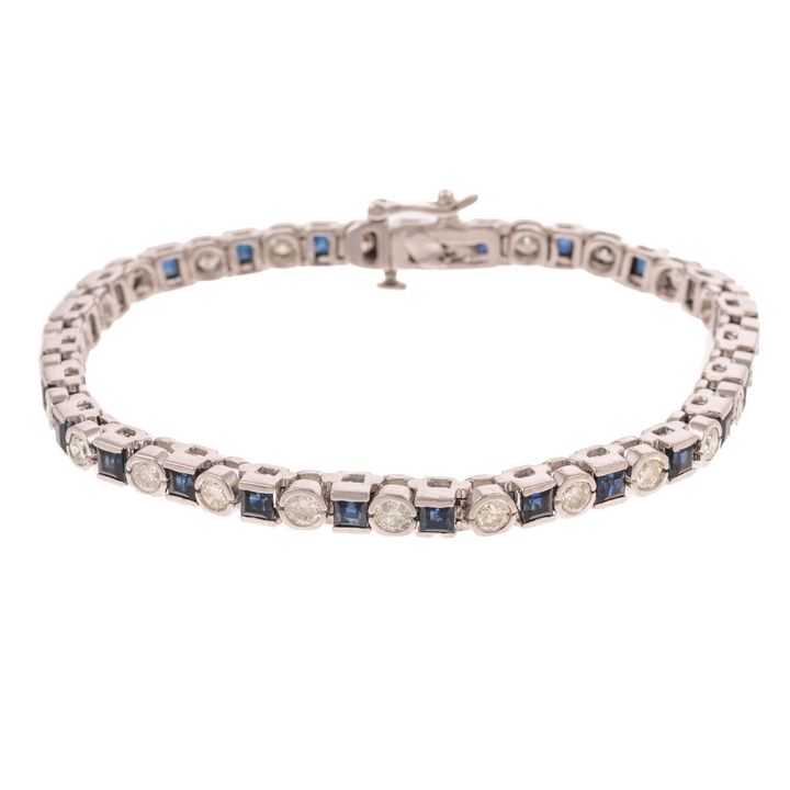 A Fine Diamond & Sapphire Line Bracelet in 14K