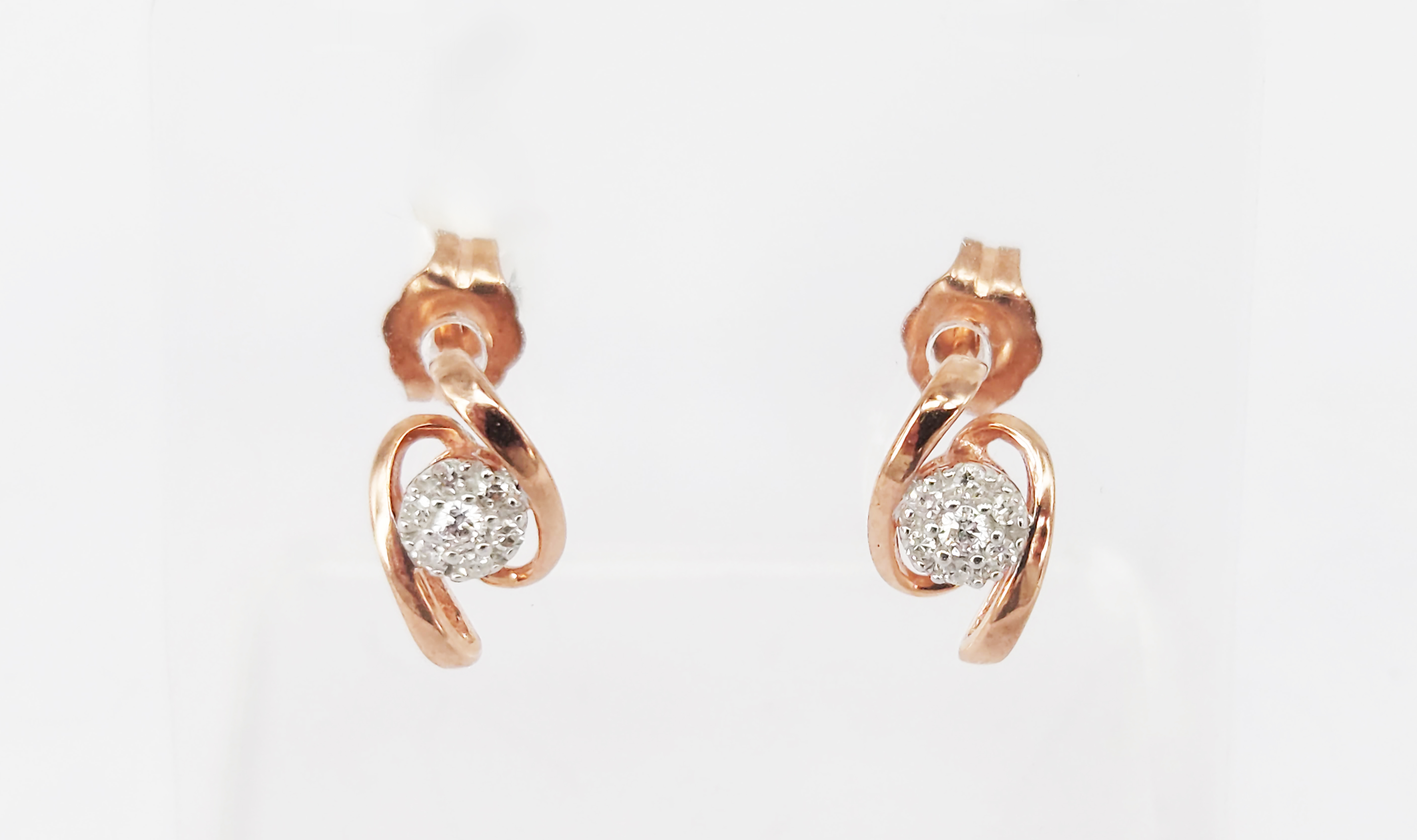 A Pair Of 9ct Rose Gold Diamond Accented Earrings