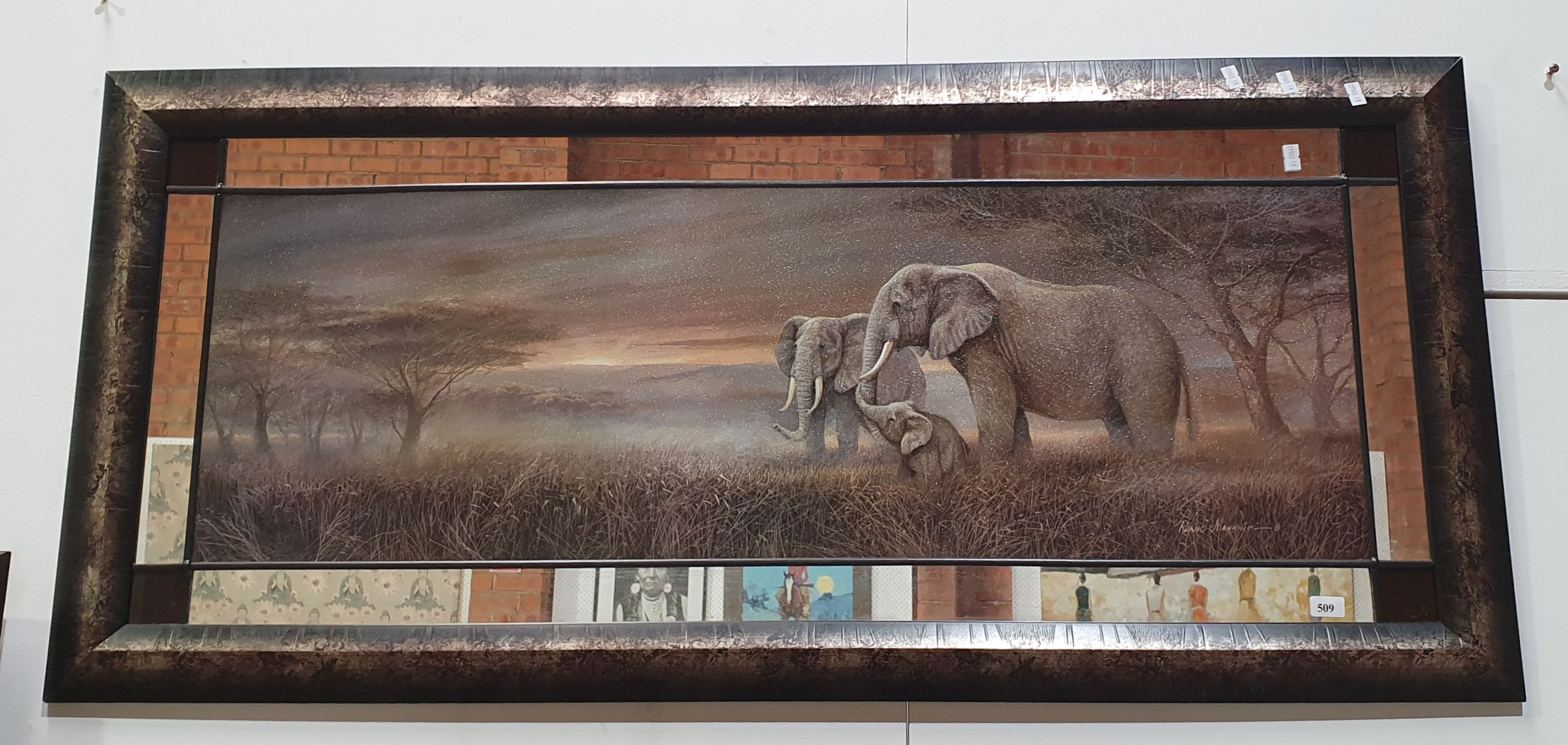 AN ELEPHANT THEMED MIRROR