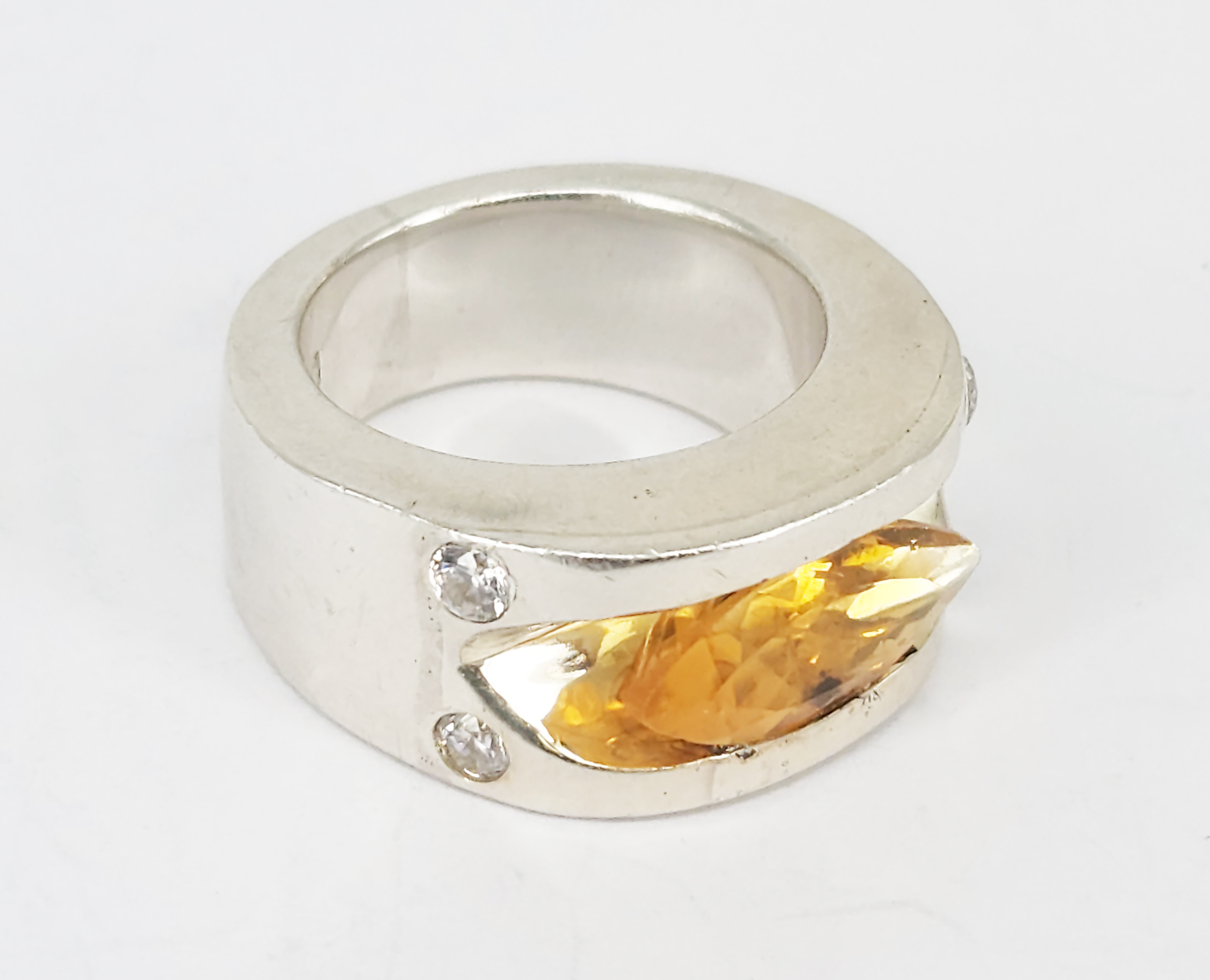 323 · A LAURENT LEGER HANDMADE SILVER AND MARQUISE CITRINE RING