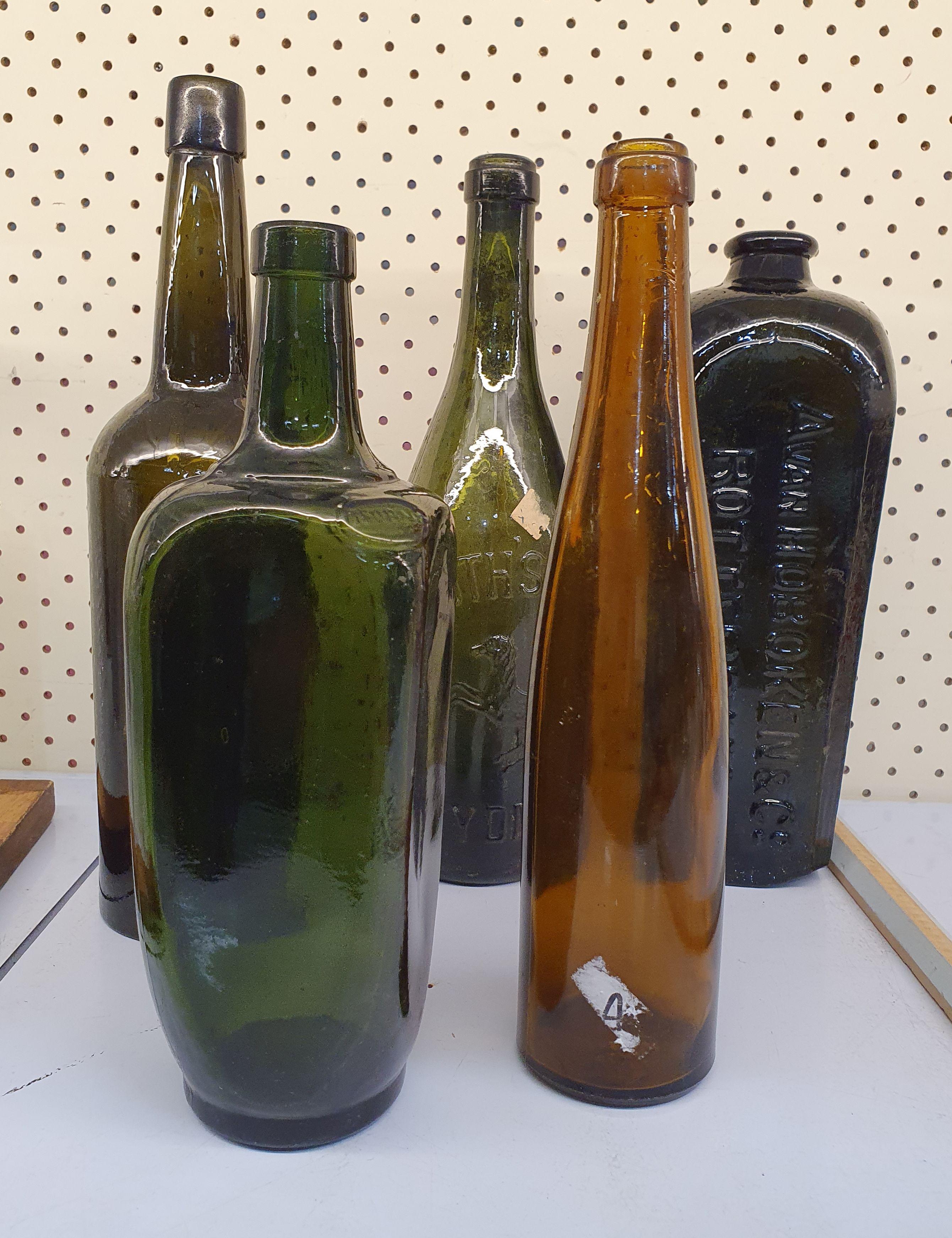 51 · A GROUP OF VICTORIAN AND OTHER EARLY GLASS BOTTLES