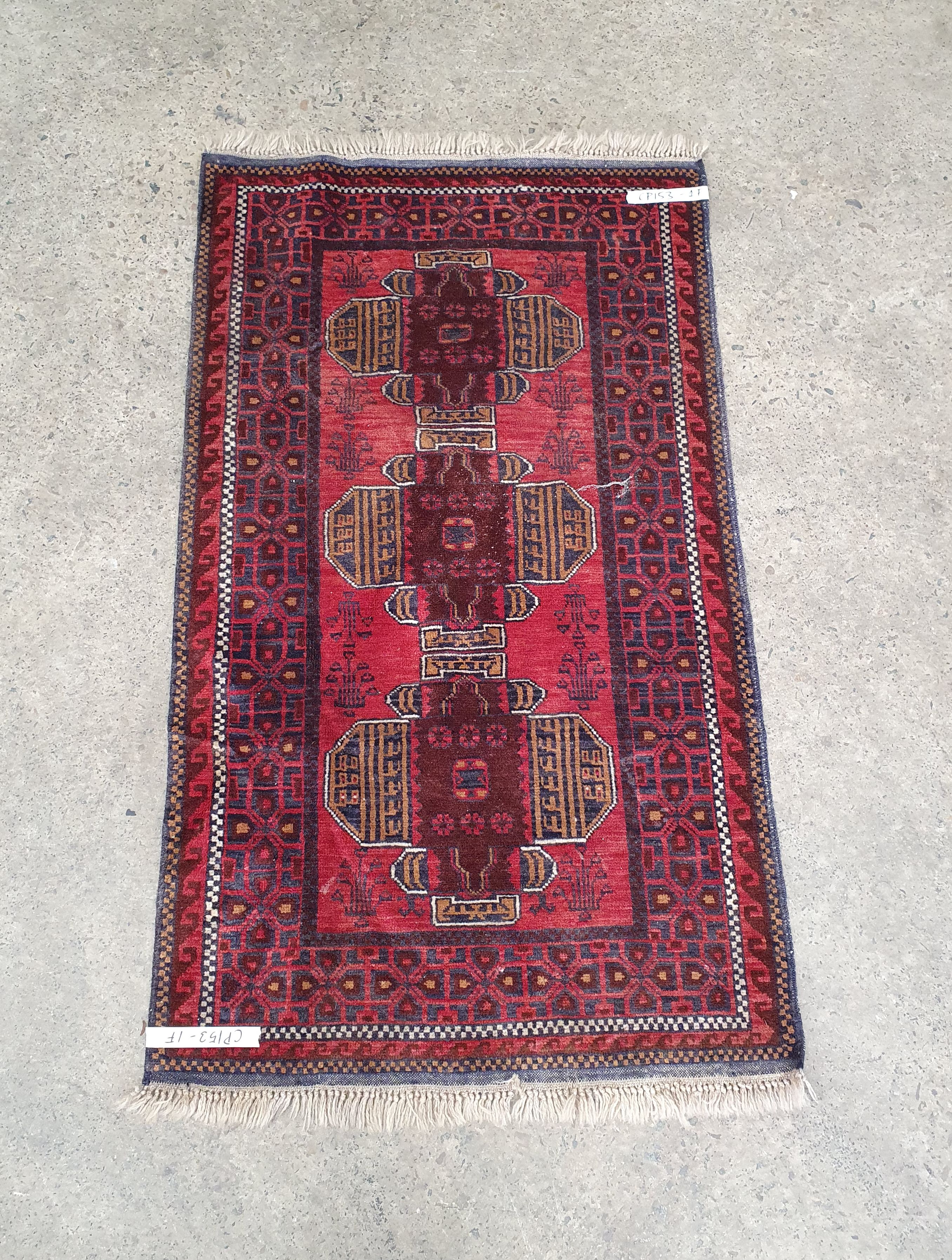 A Hand Knotted Wool Rug
