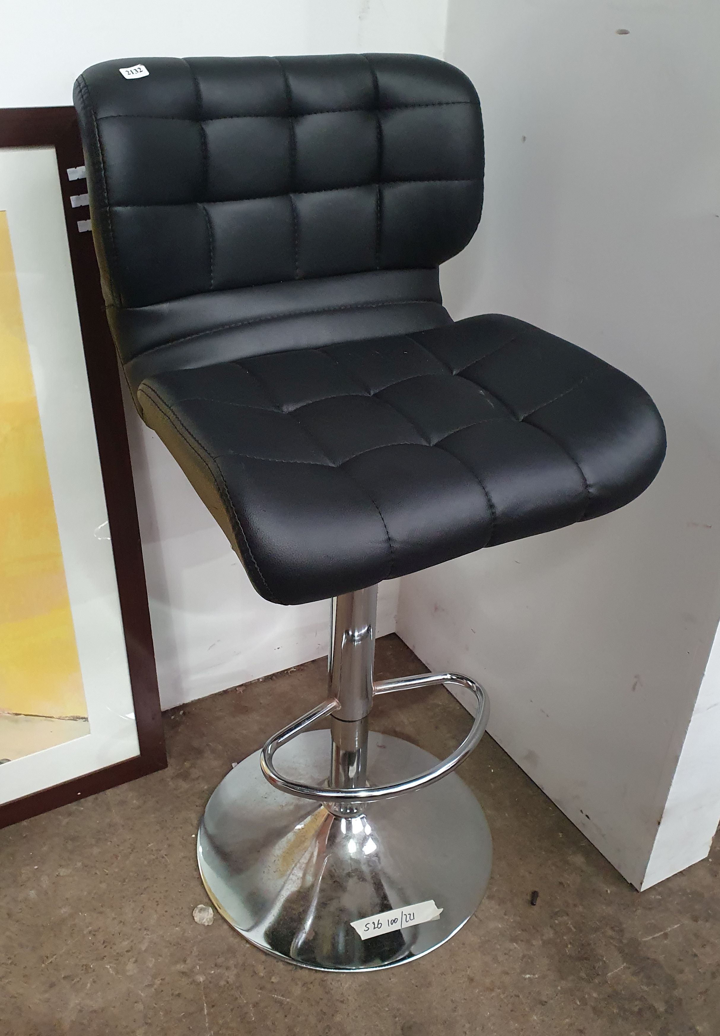 A Chrome Based Leatherette Swivel Bar Stool