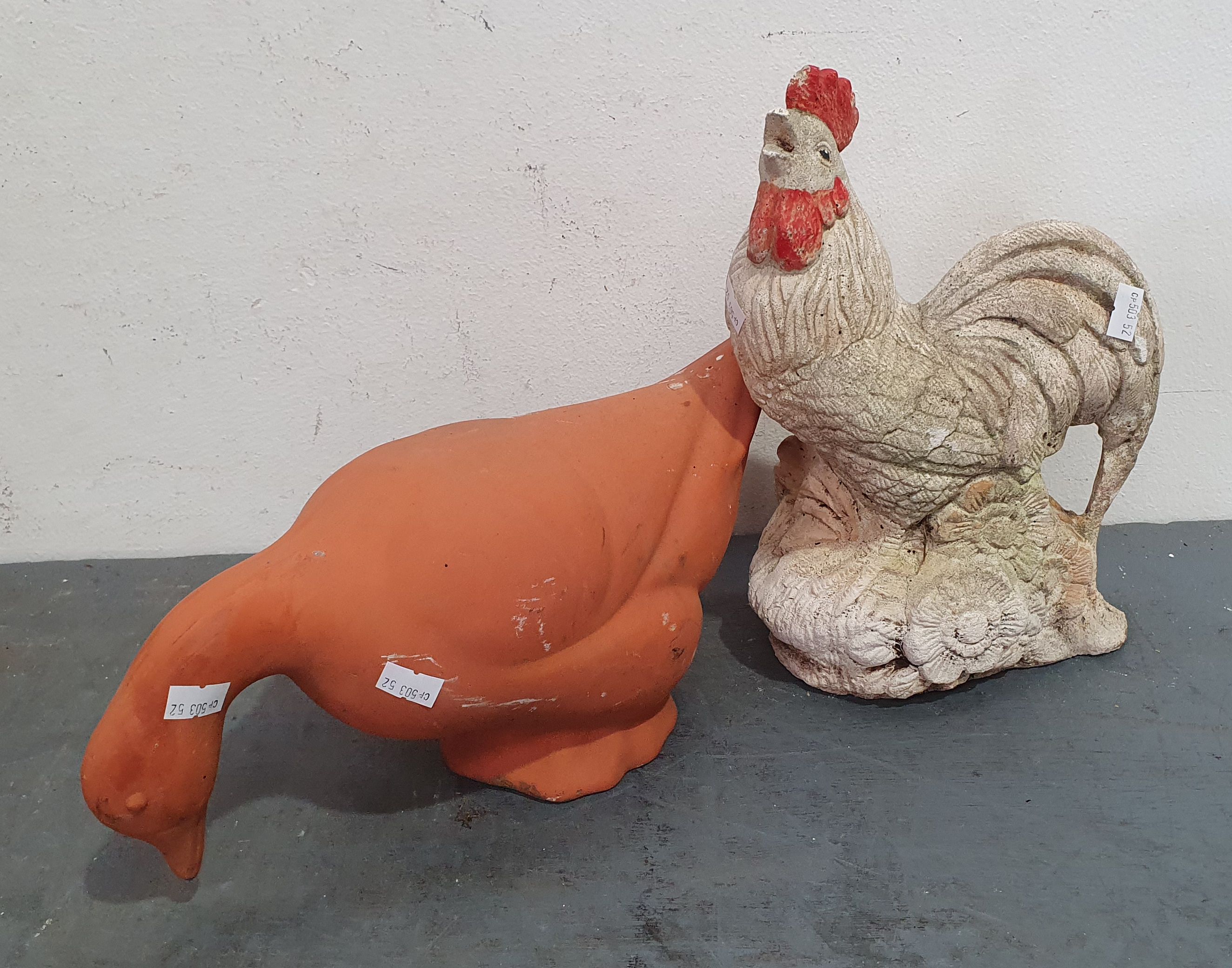 A Concrete Chicken Garden Decoration
