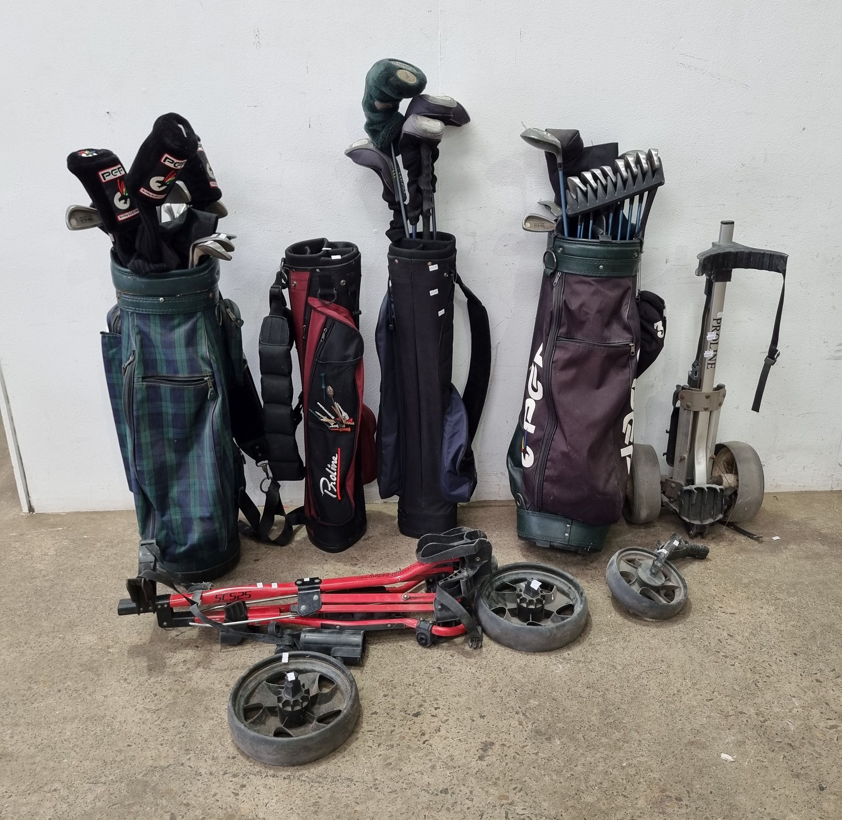 1419 · THREE VARIOUS GOLF BAGS