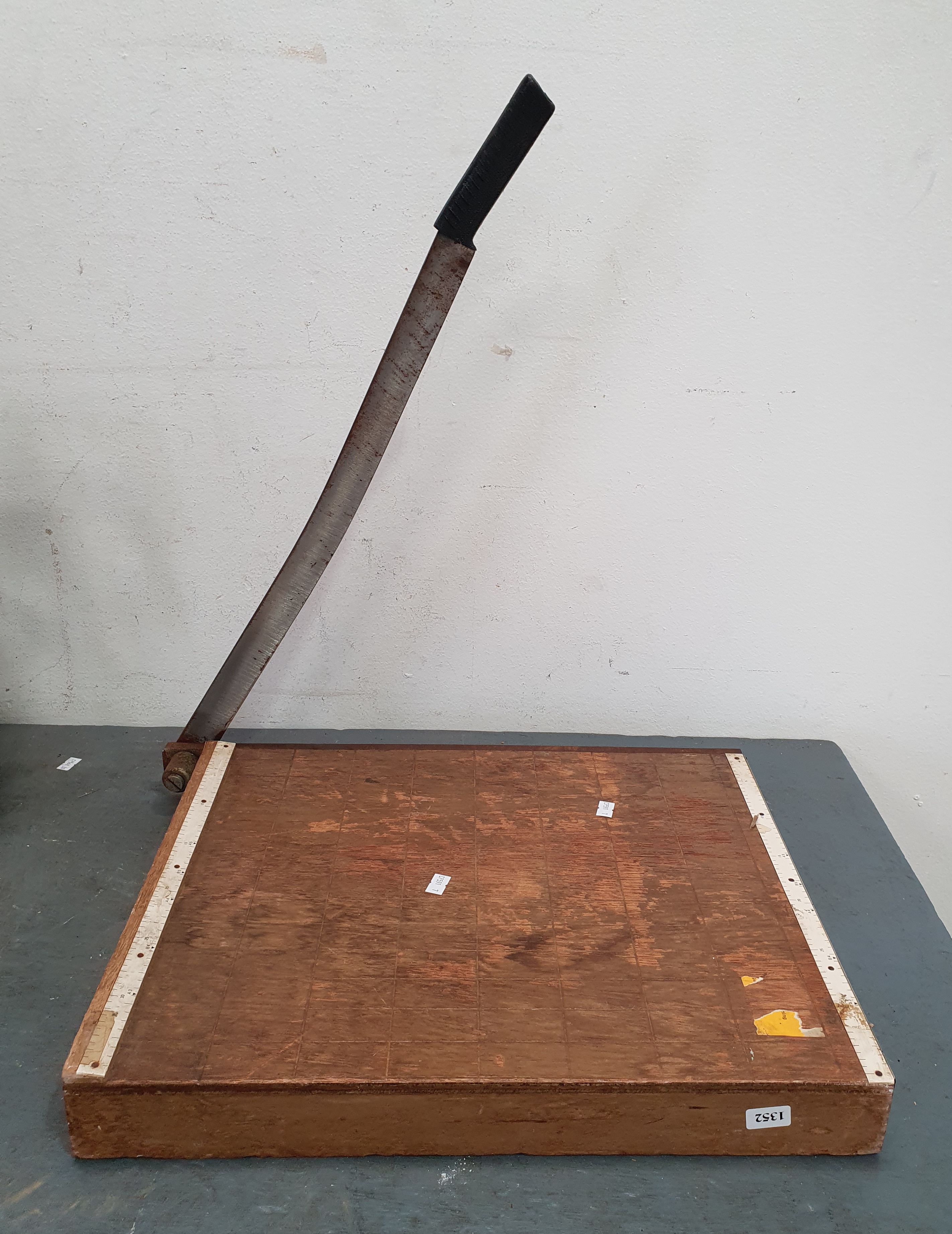 A PAPER GUILLOTINE
