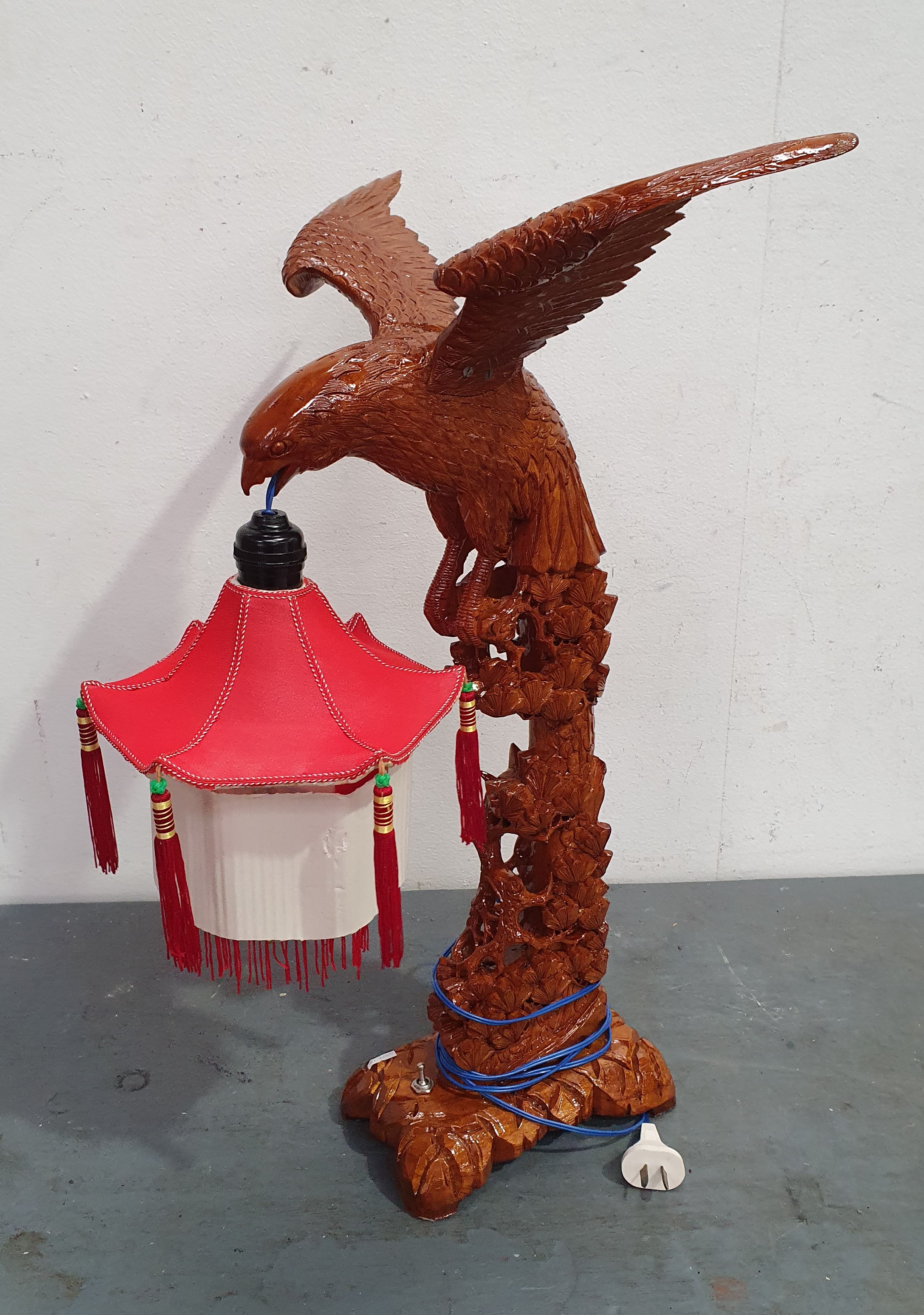 202 · AN ORIENTAL STYLE FALCON LAMP