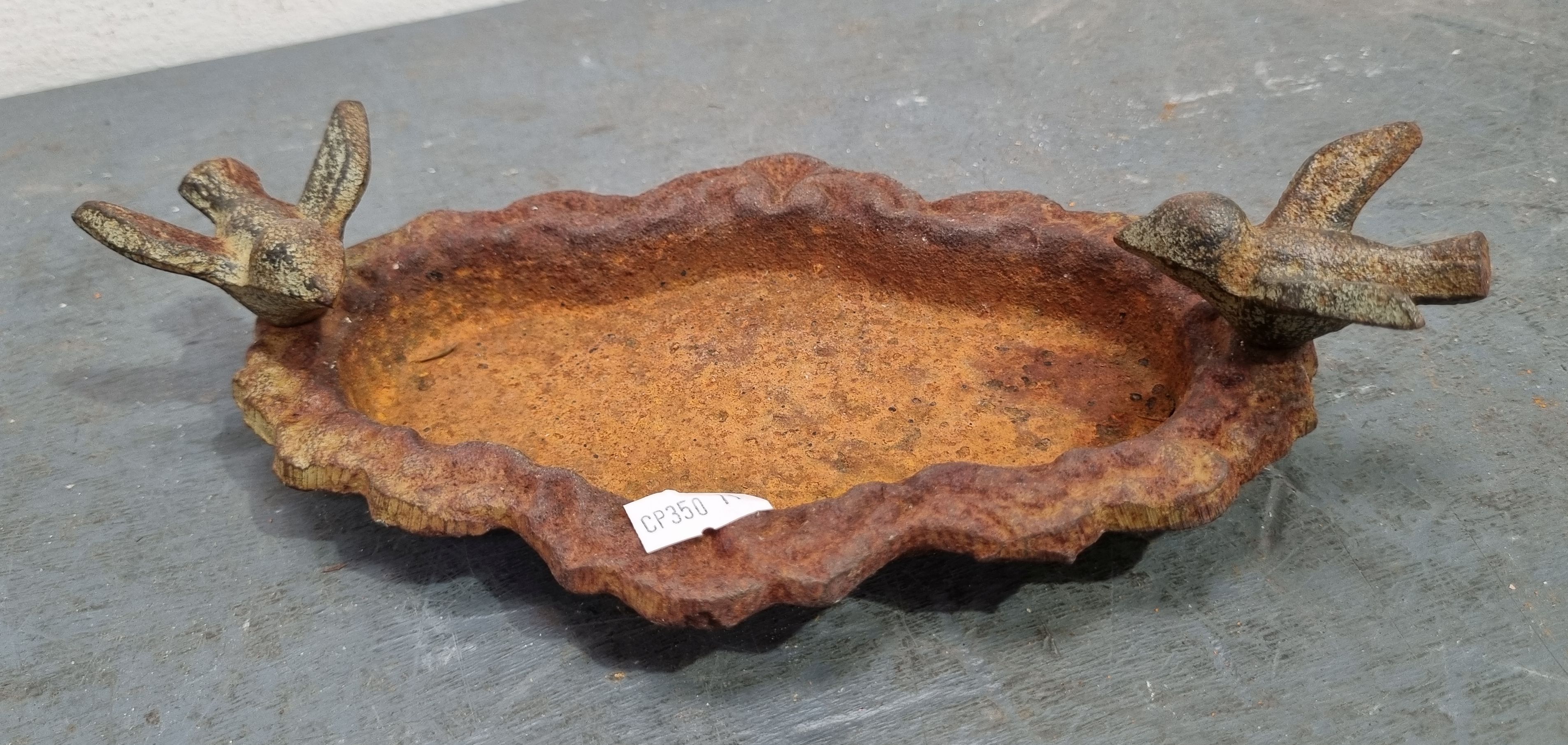 A RUSTIC METAL DISH