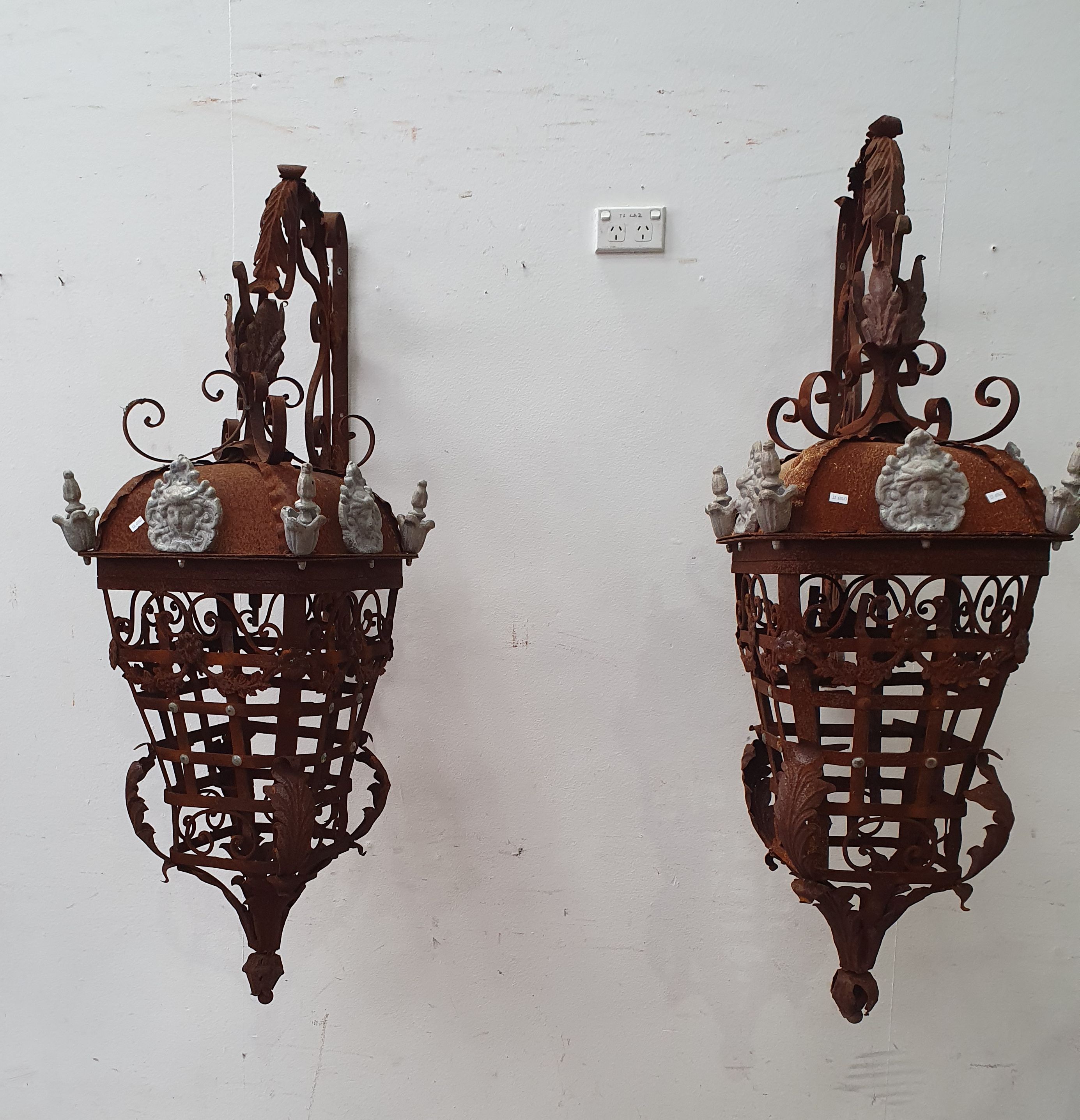 1022 · A LARGE PAIR OF IRON HANGING LANTERNS