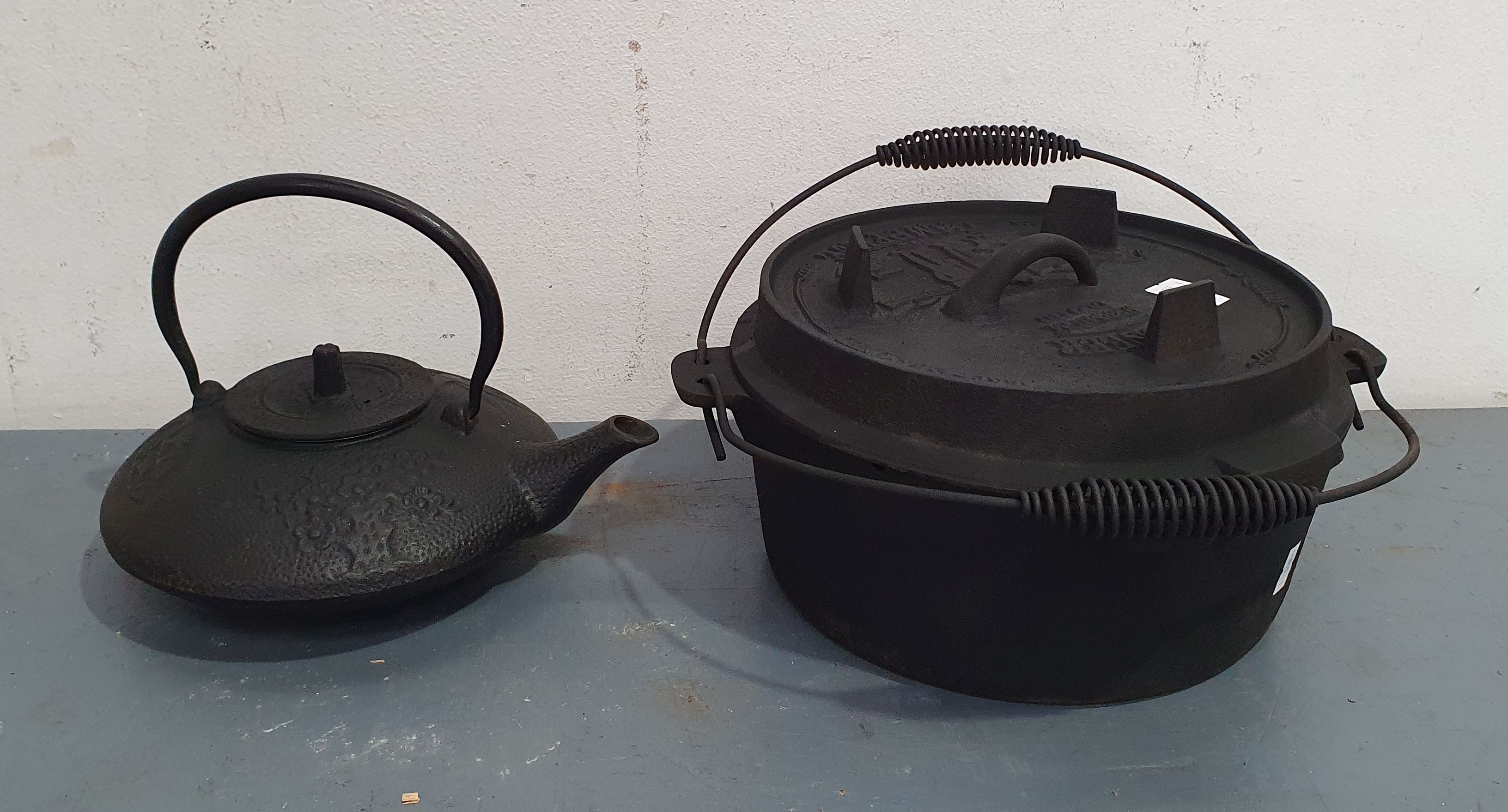 1276 · TWO VARIOUS CAST IRON ITEMS