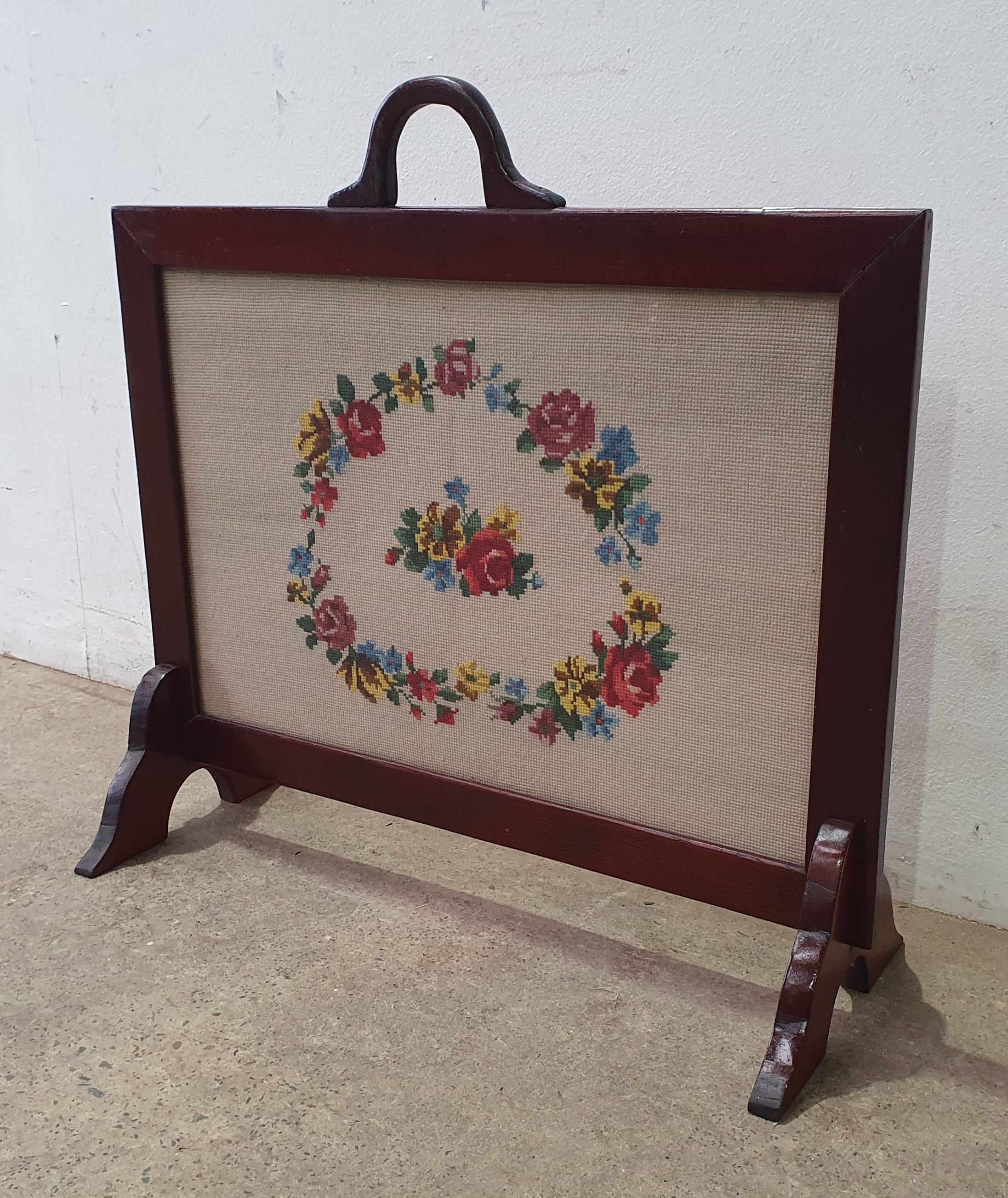 A Needle Point Fire Screen
