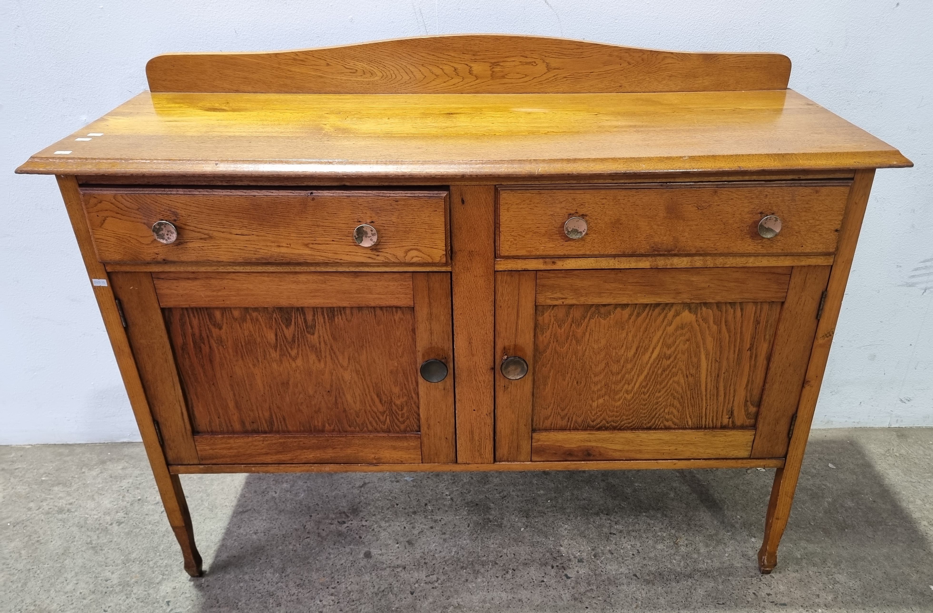 2101 · AN OAK SIDEBOARD