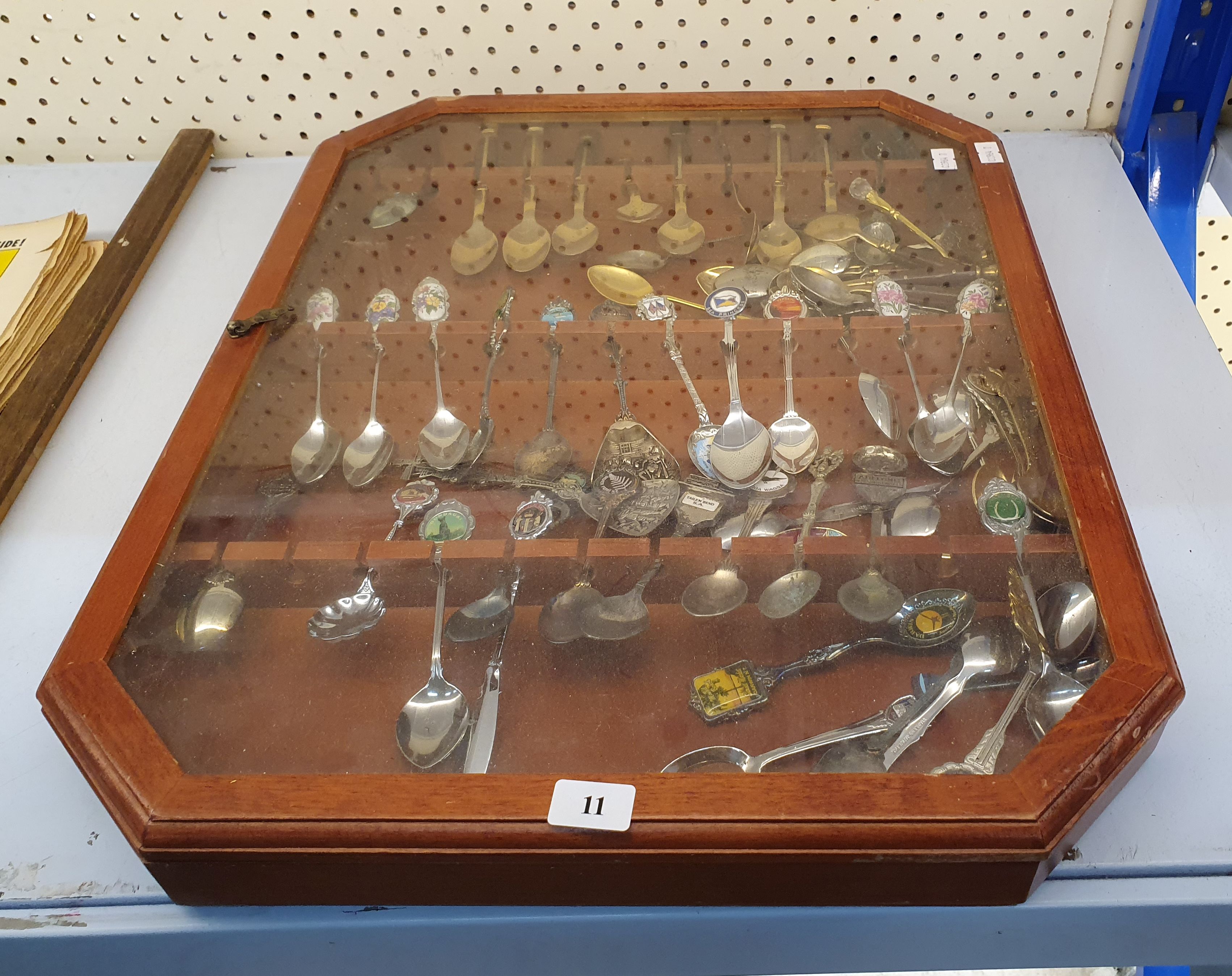 11 · A WALL DISPLAY CASE WITH SOUVENIR SPOONS