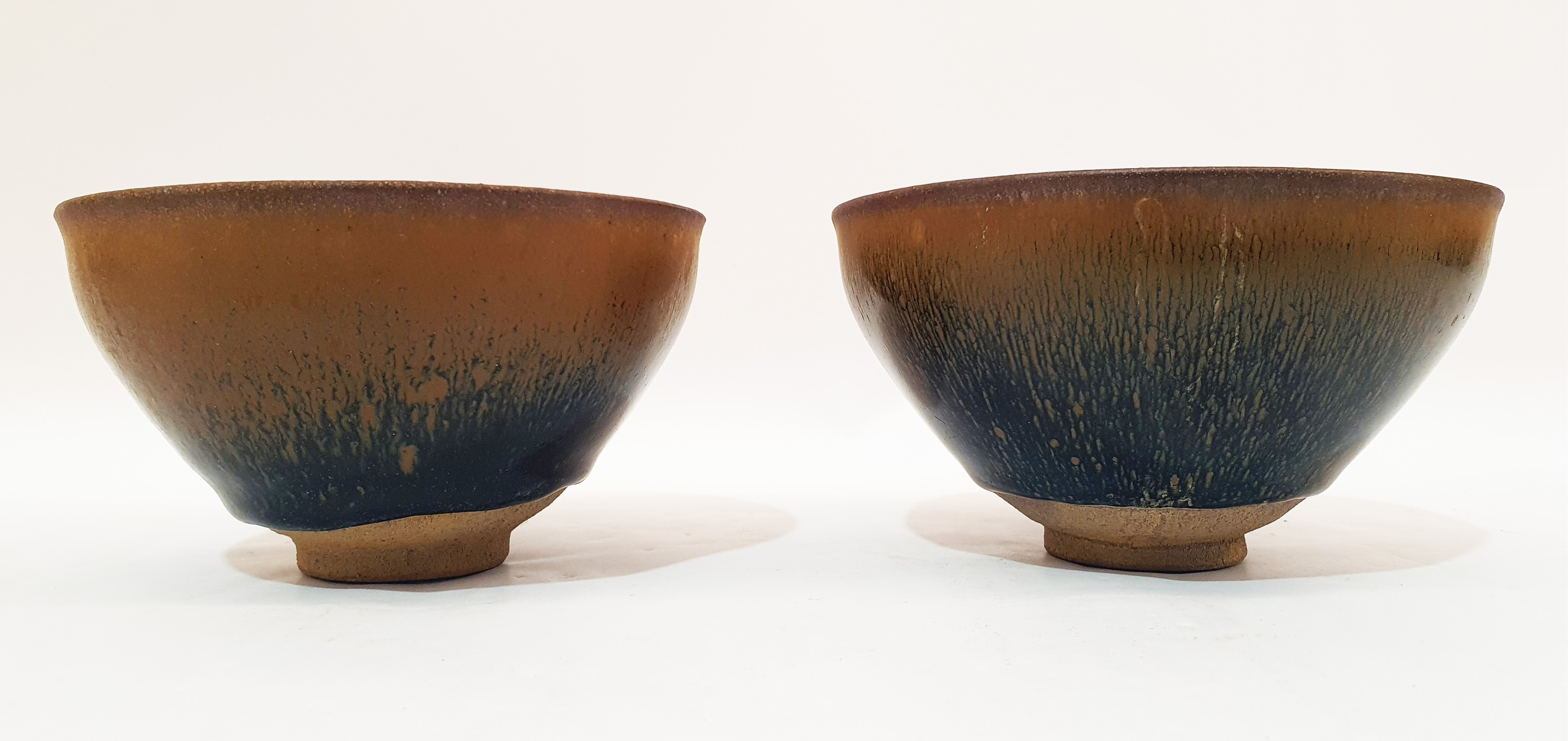 554 · A PAIR OF CHINESE HARE'S FUR GLAZED BOWLS