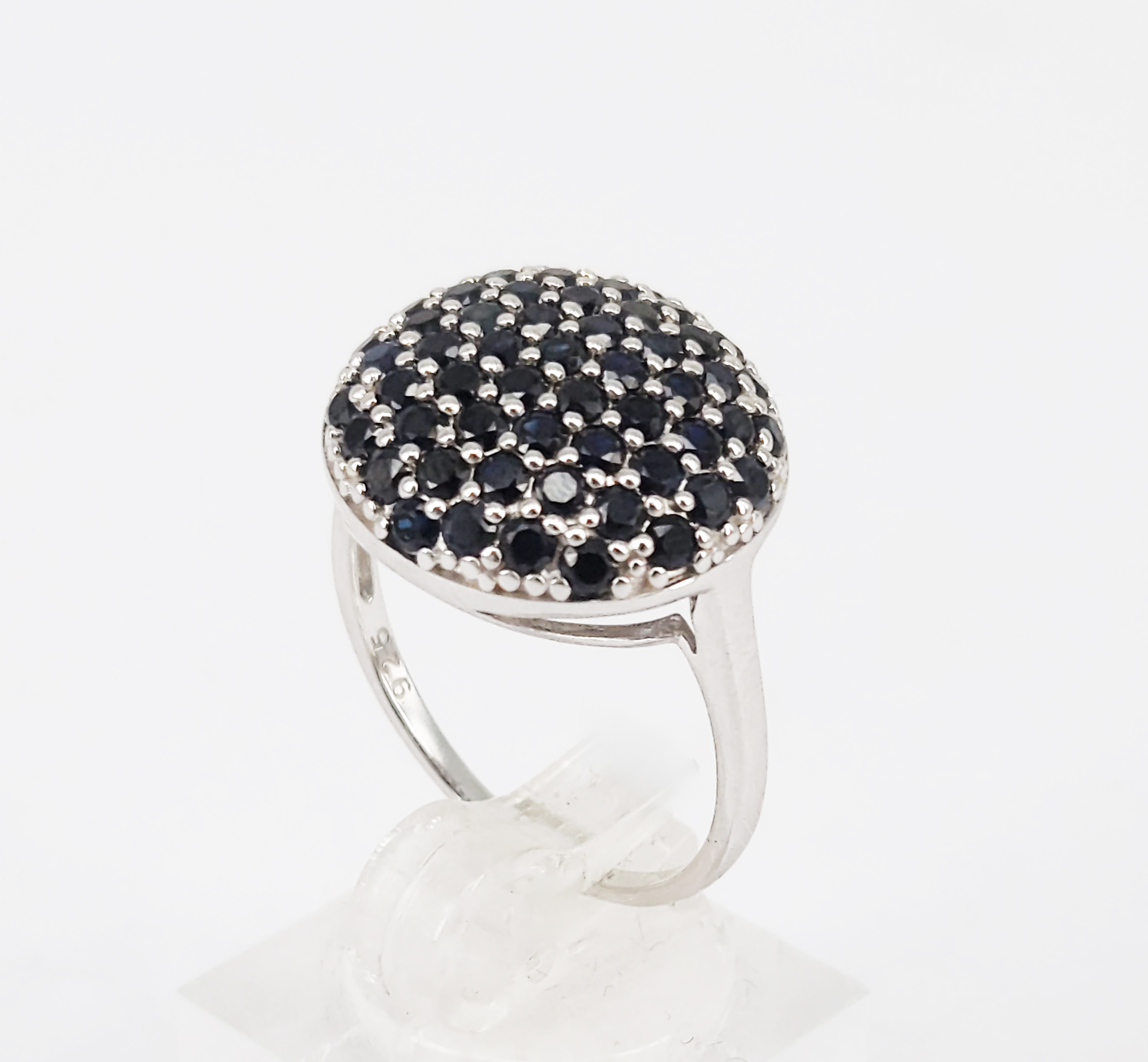 A Silver And Sapphire Cluster Dress Ring
