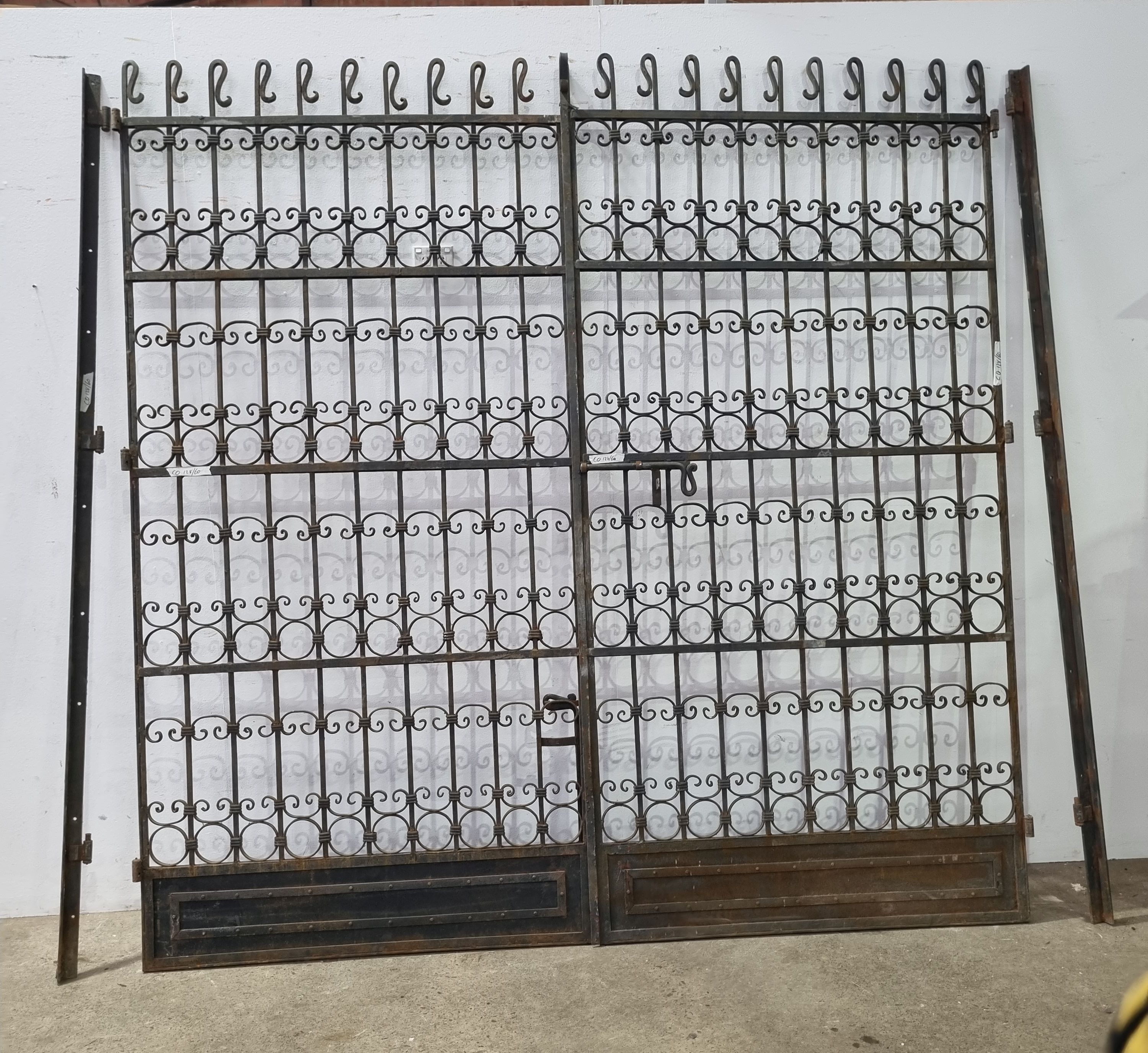 A Large Pair Of Iron Driveway Gates
