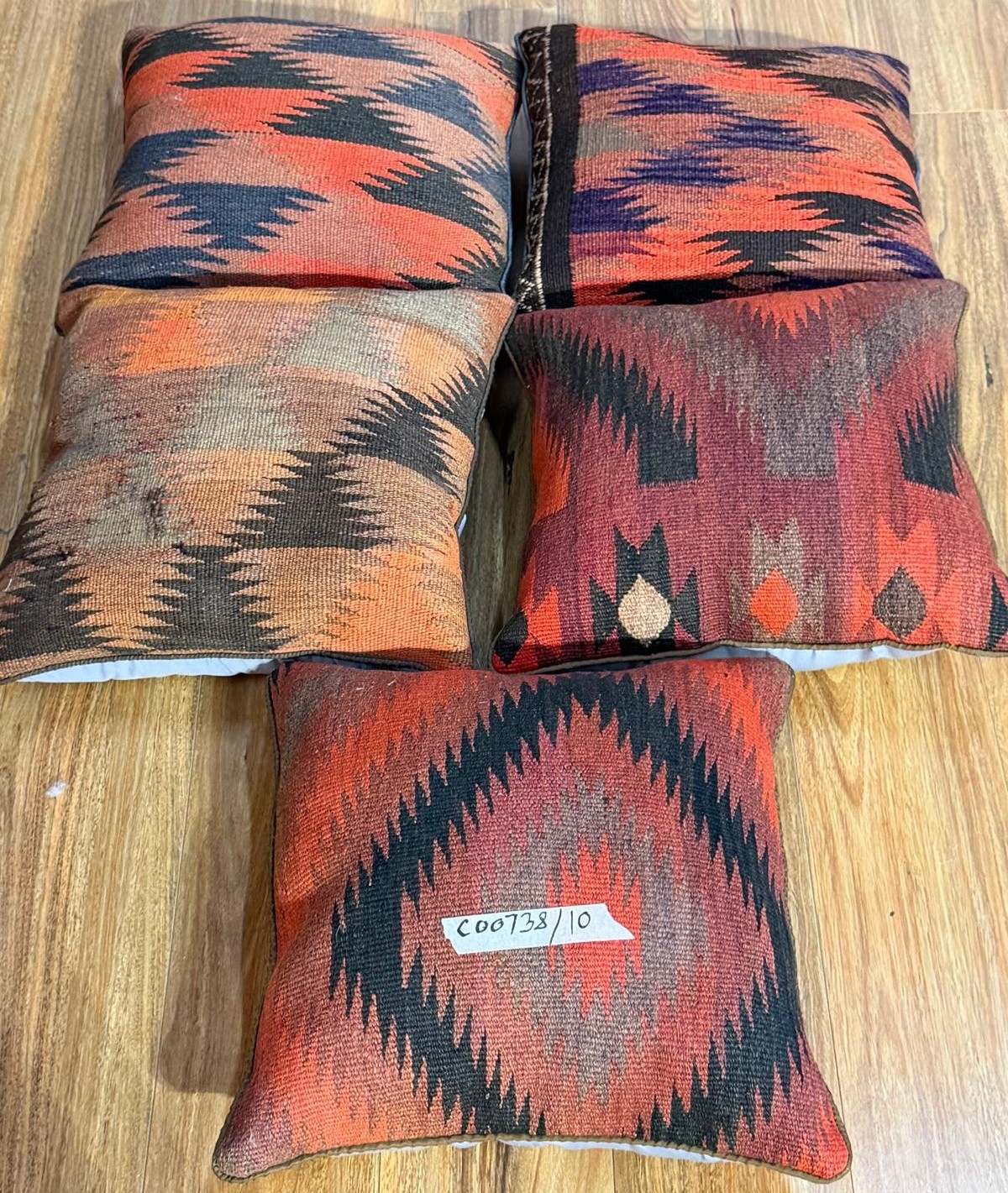 A Group Of Five Afghan Kilim Cushions