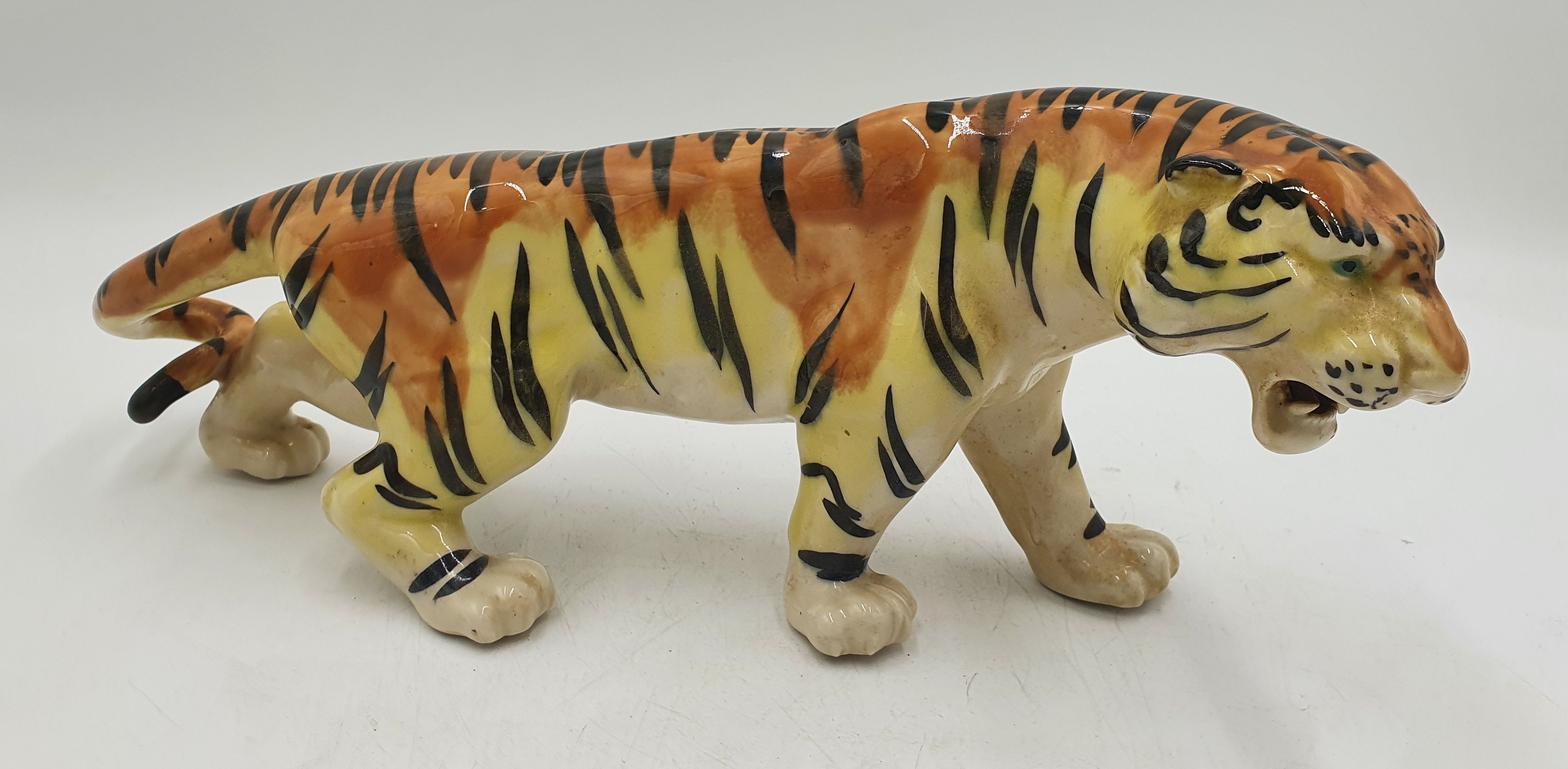 A CHINESE CERAMIC TIGER FIGURE