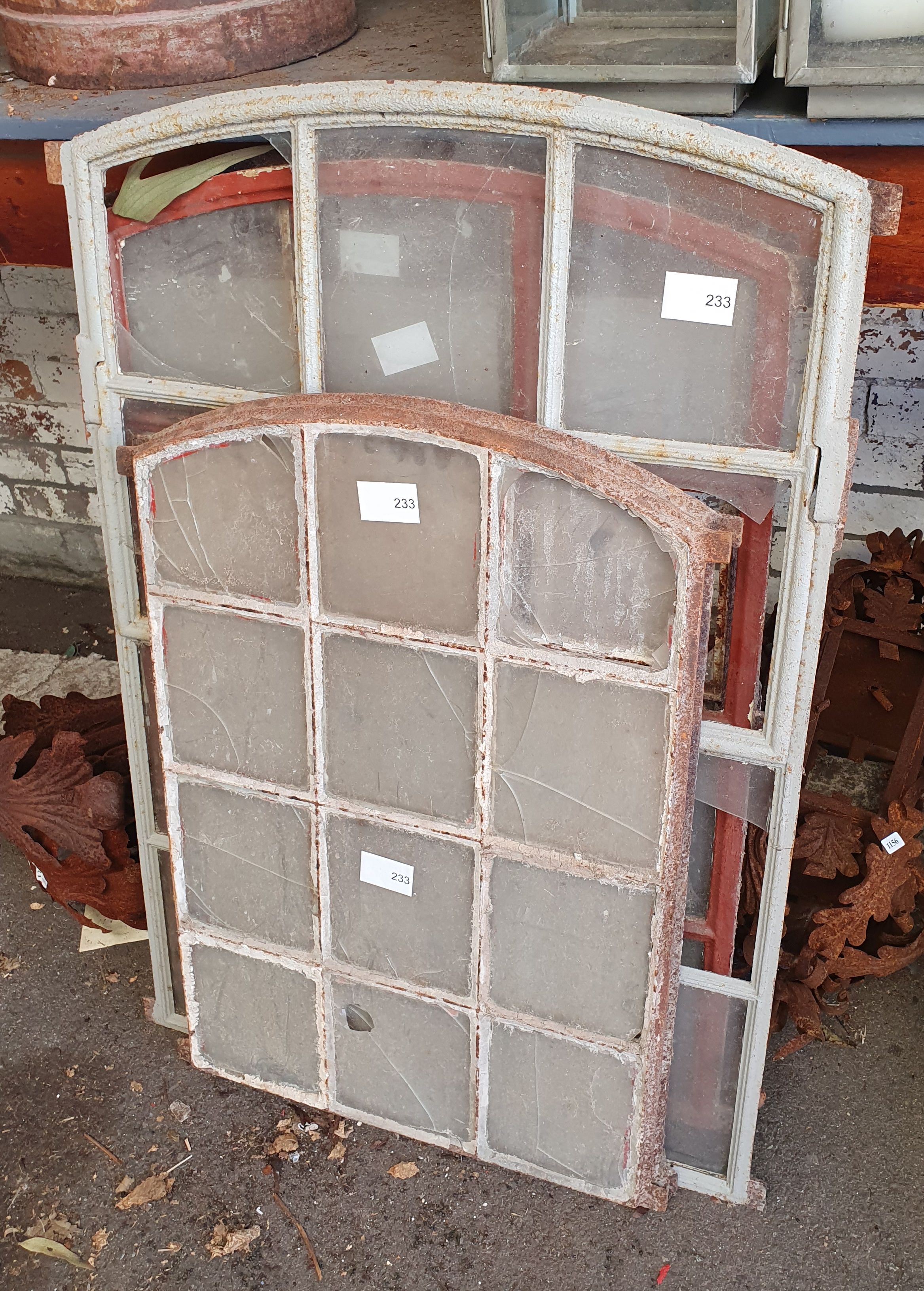 A Group Of Wrought Iron Framed Windows