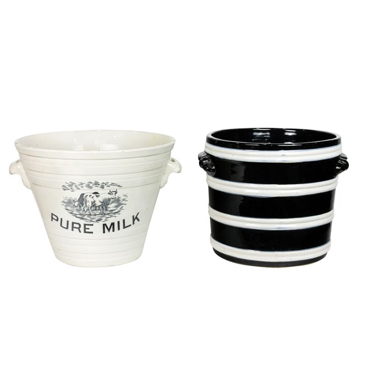 Two English ceramic advertising dairy pails and two covers