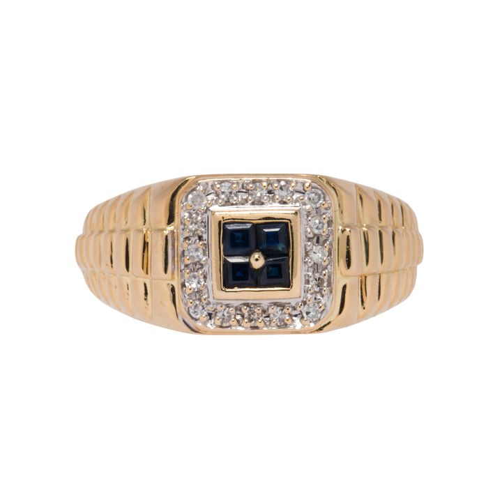 A sapphire, diamond and 14k gold ring