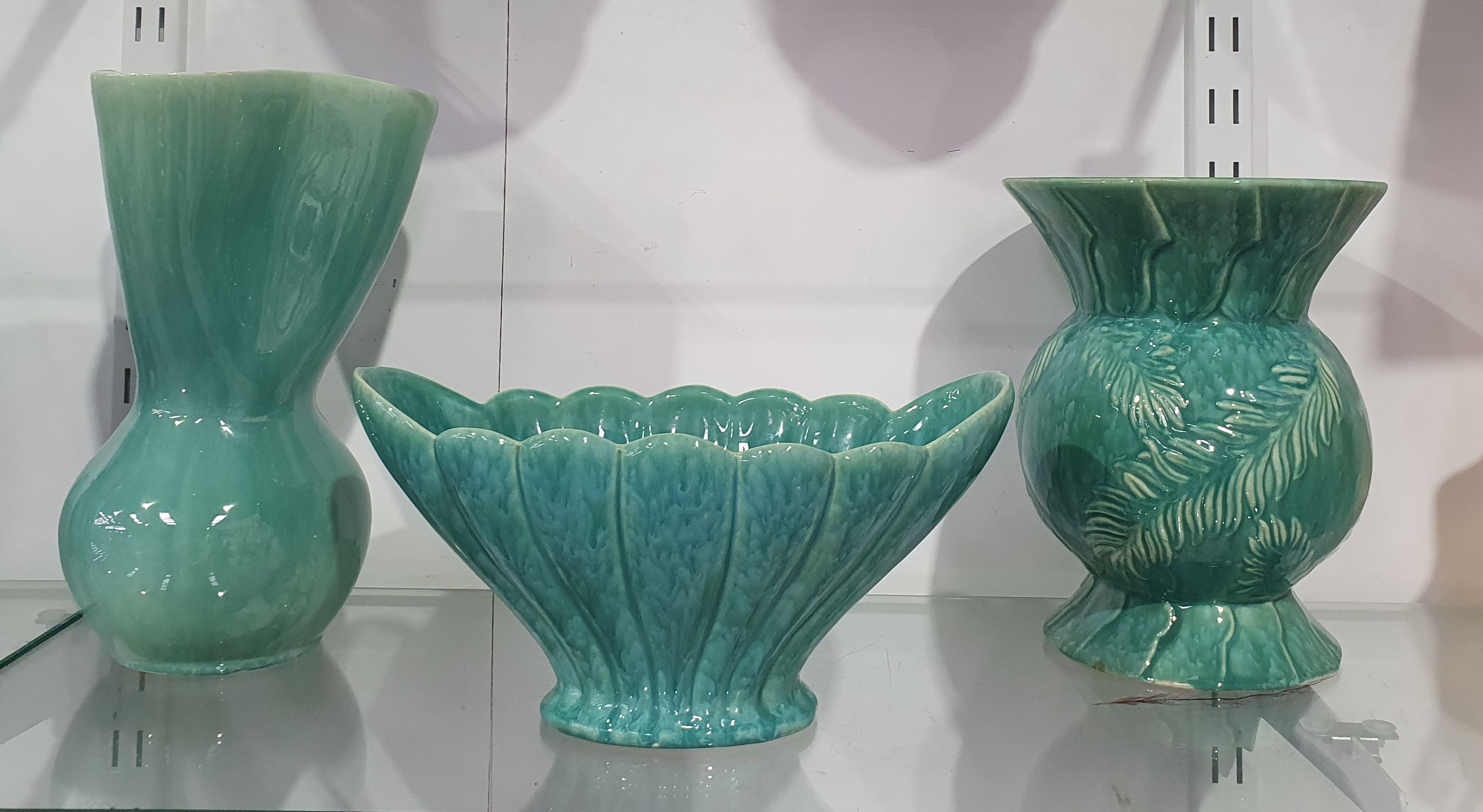 697 · THREE TEAL MCP POTTERY VASES