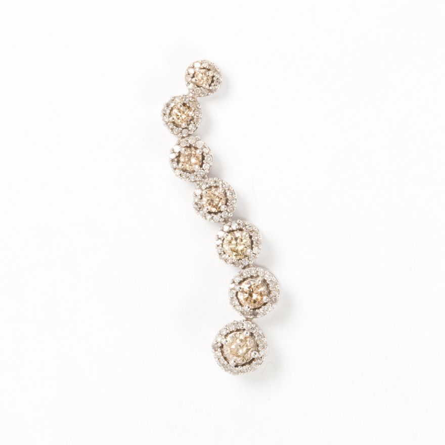 A champagne diamond and ten karat white gold pendant