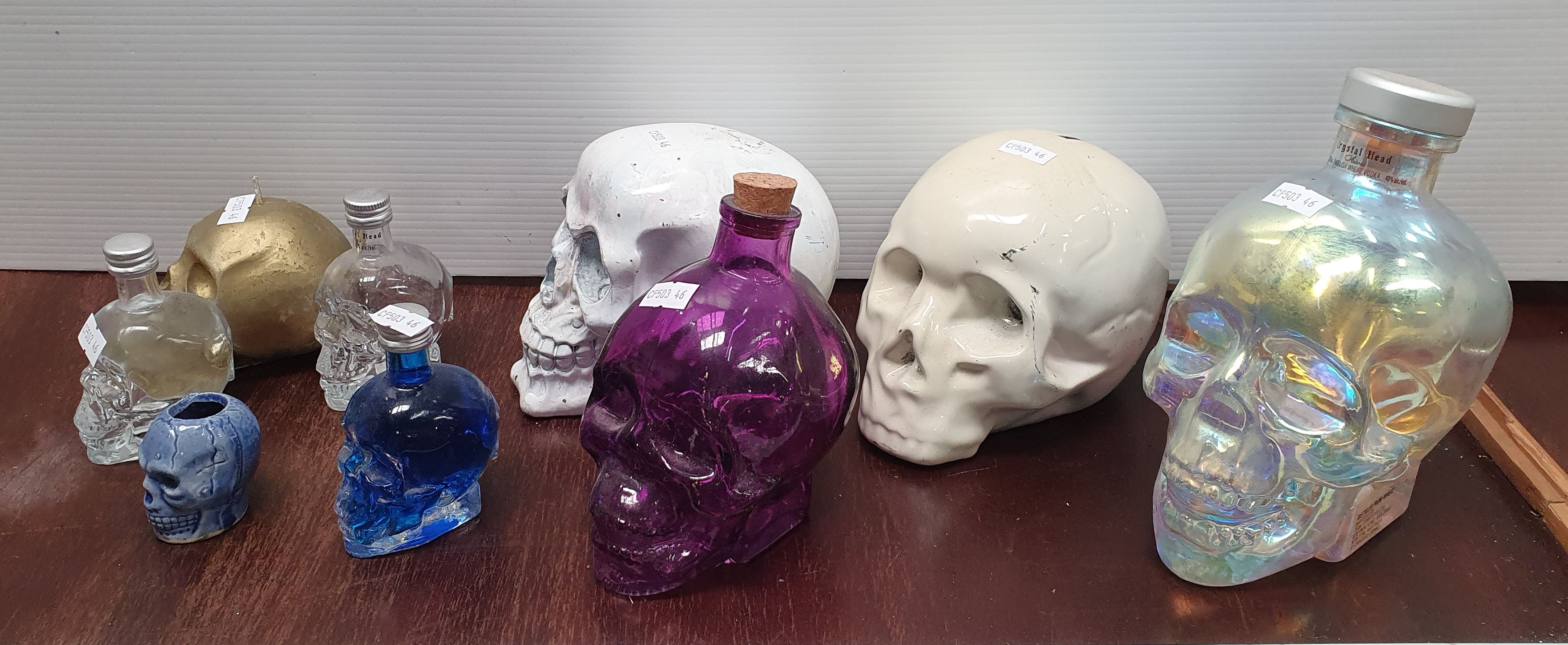 167 · A GROUP OF SKULL FORM ITEMS