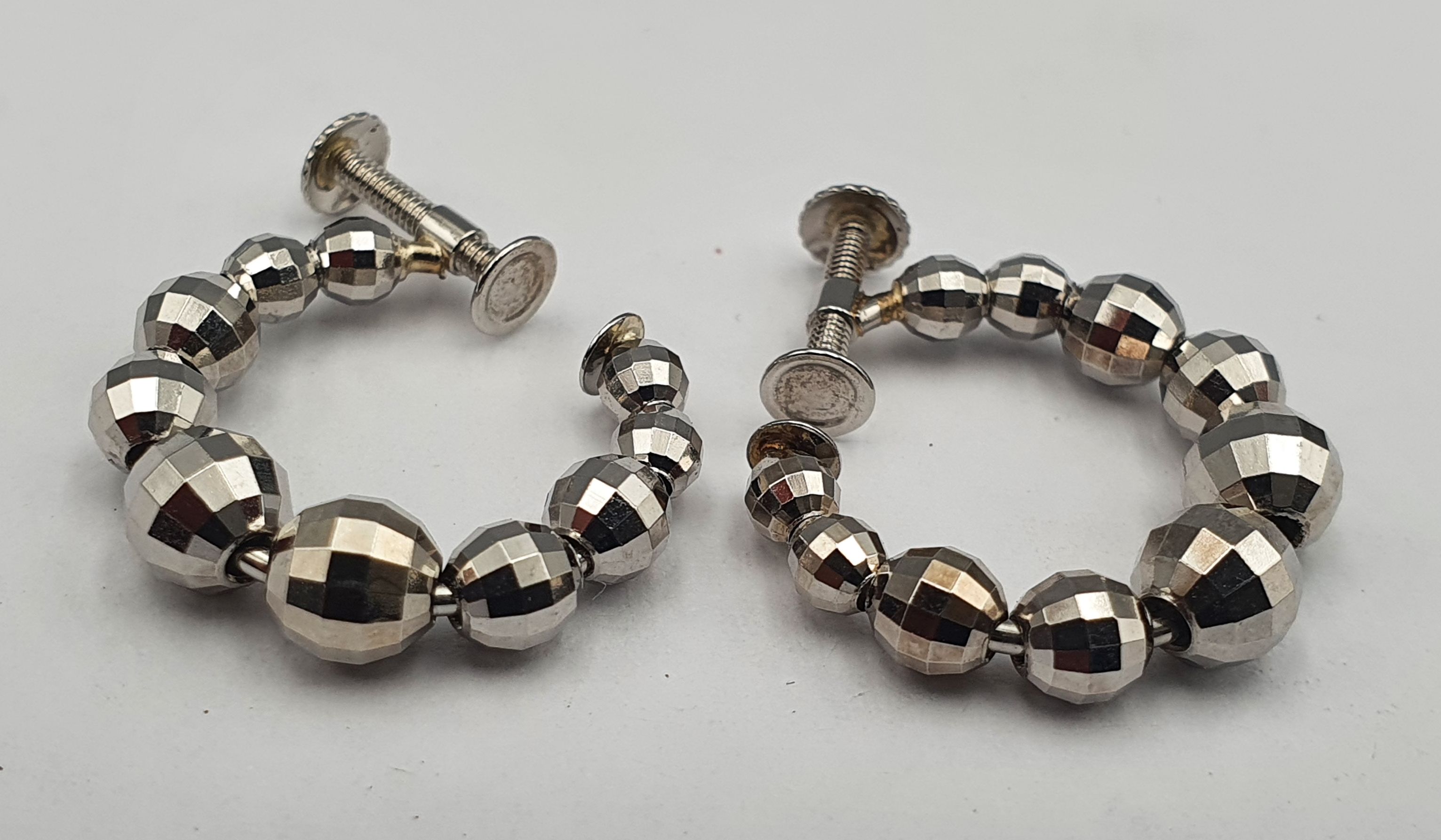280 · A PAIR OF PLATINUM EARRINGS