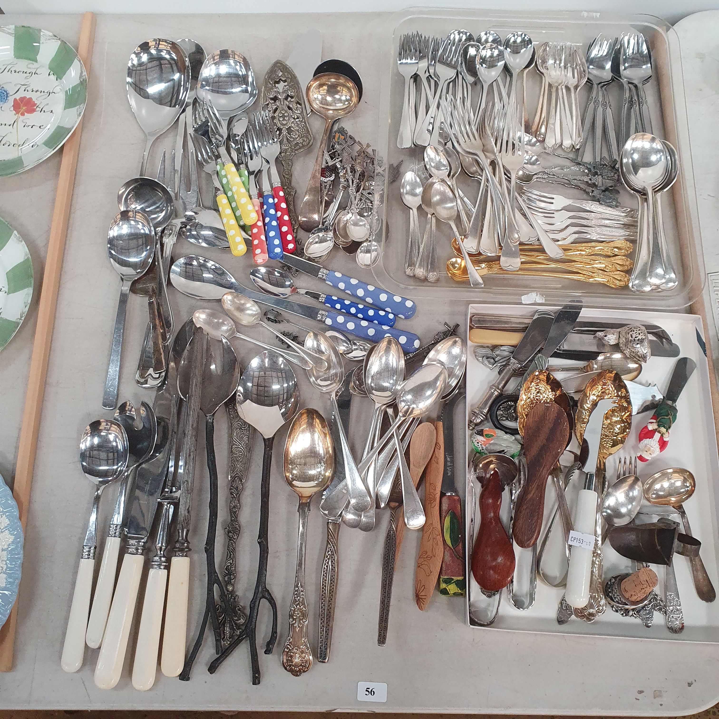 56 · A SELECTION OF FLATWARE AND SERVING UTENSILS