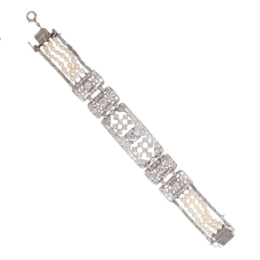 A diamond, cultured pearl and platinum bracelet