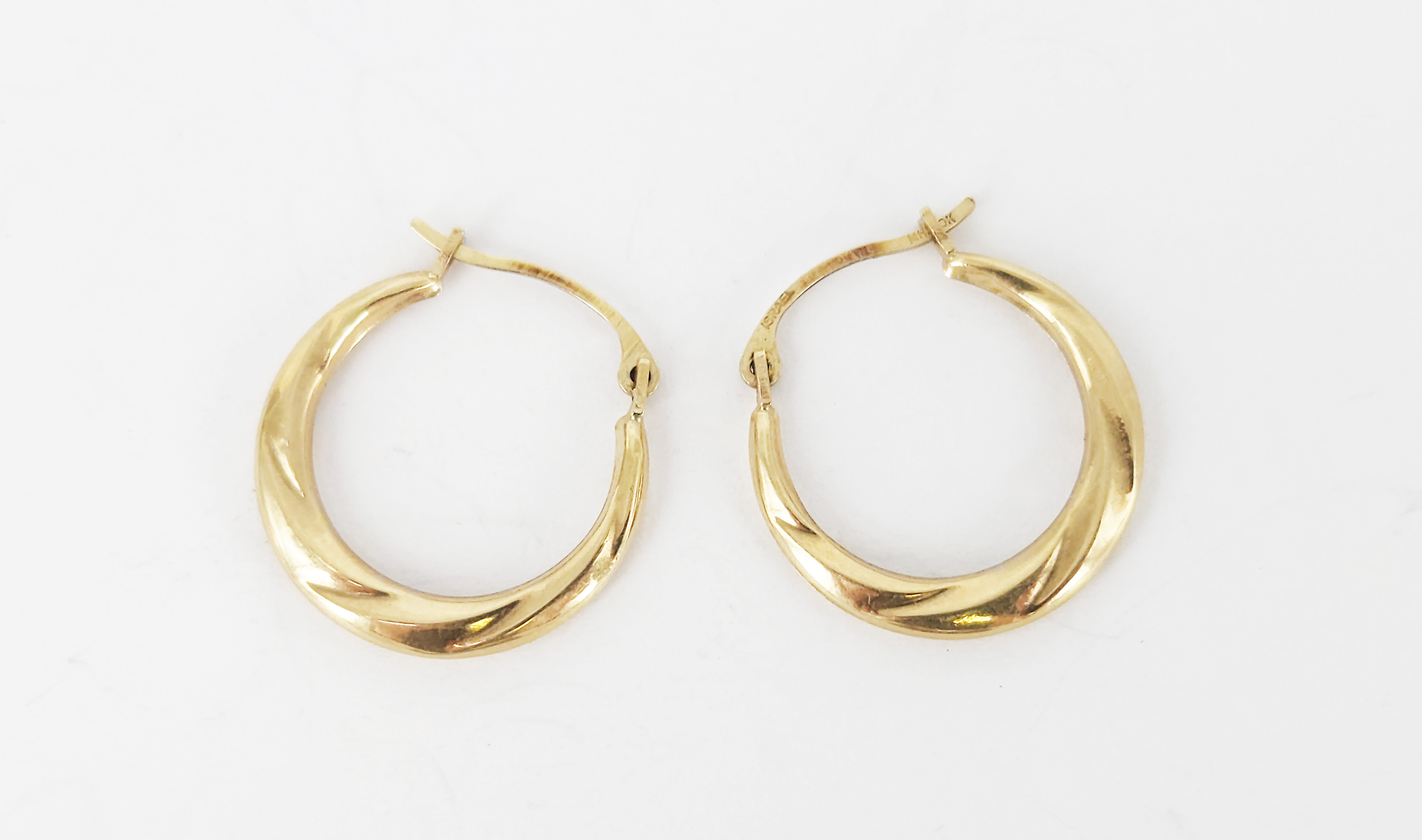 A Pair Of 10ct Yellow Gold Hoop Earrings