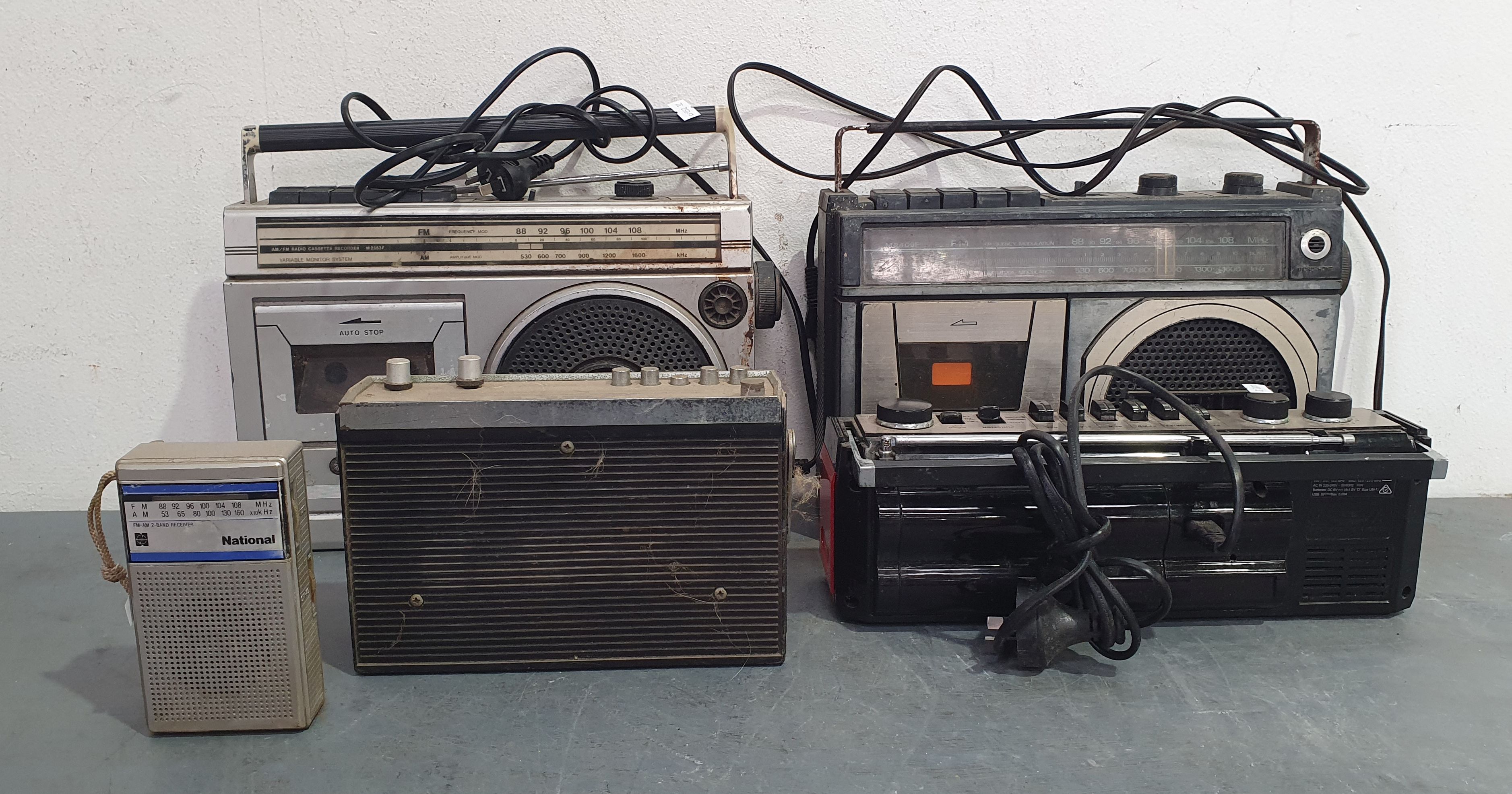 A Box Of Various Radios