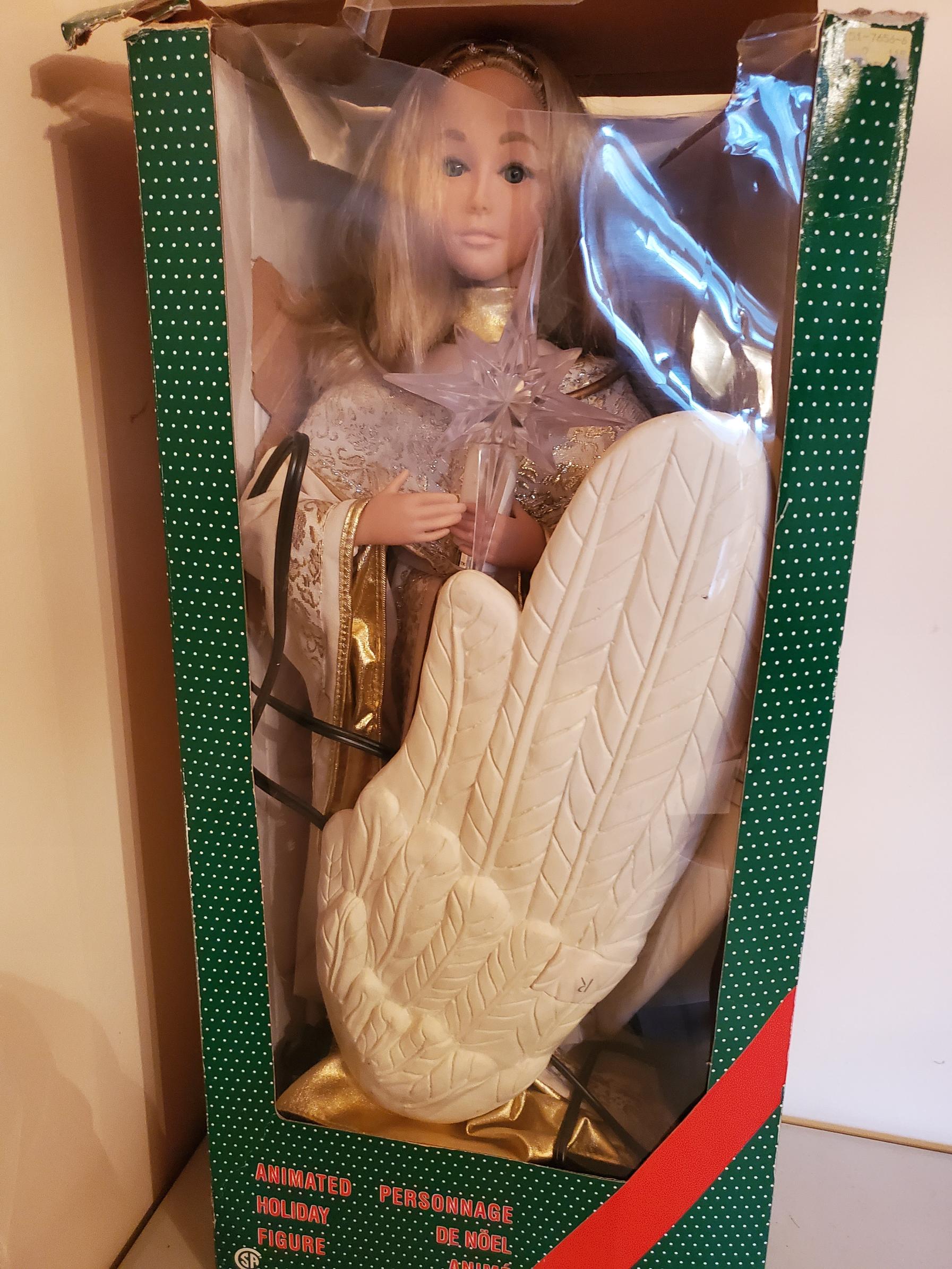 ANGEL WITH LIGHT ON HAND | Estate Sales Niagara
