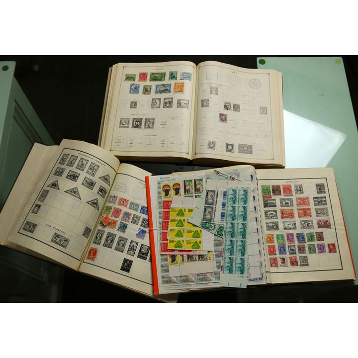 Three binders containing Russian and Chinese stamps