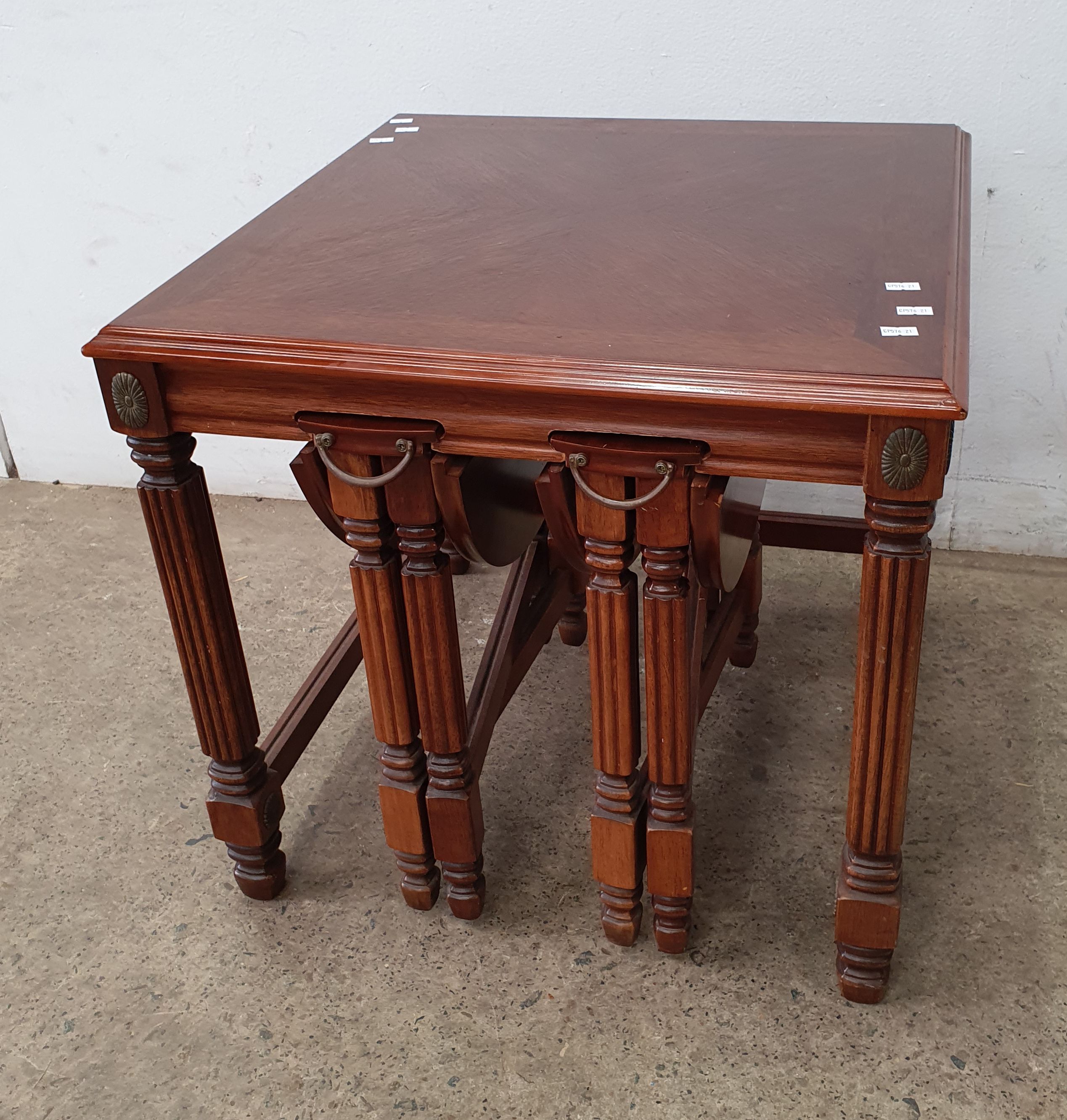 A Nest Of Mahogany Tables