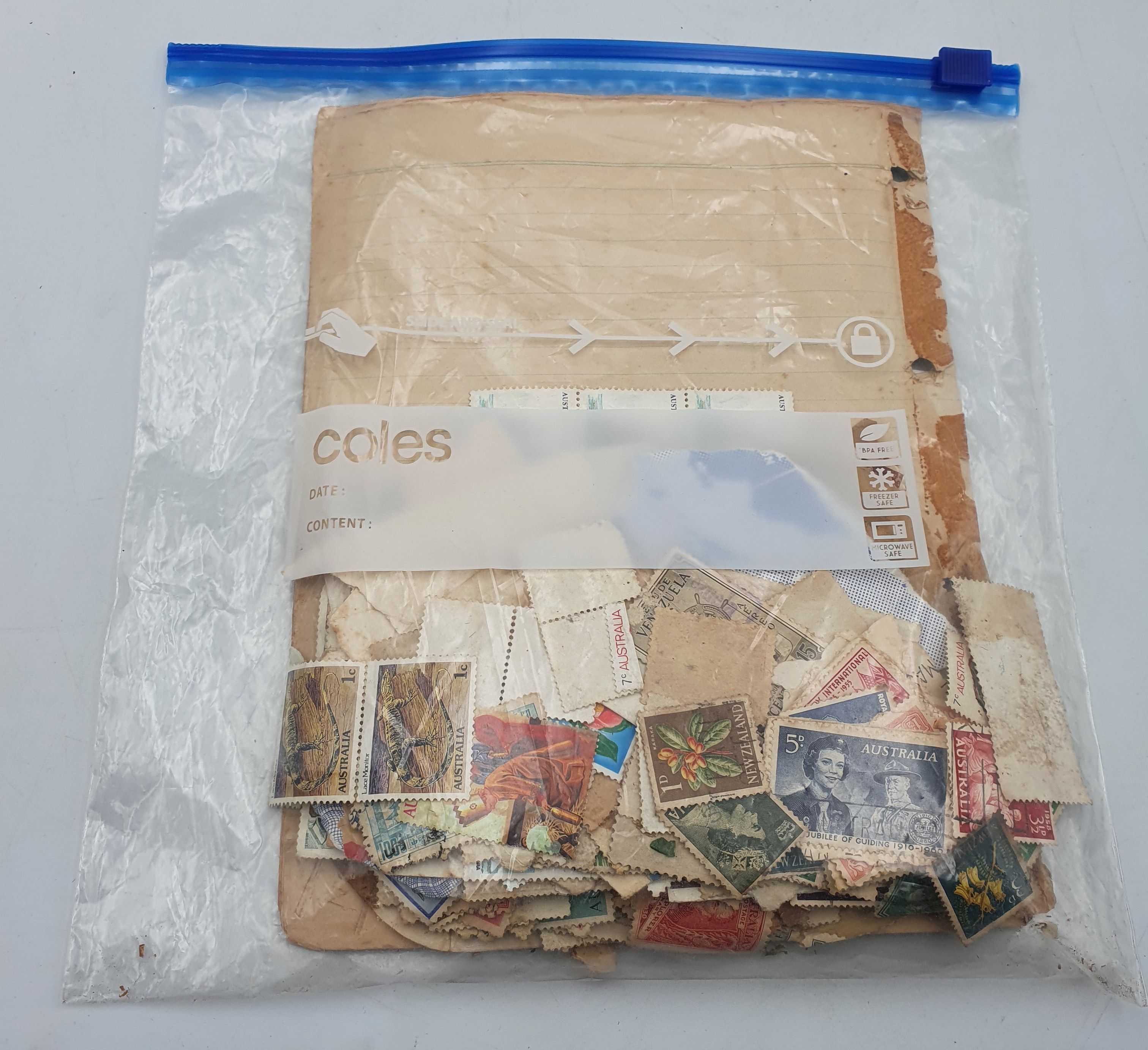 A SMALL QUANTITY OF CANCELLED POSTAGE STAMPS