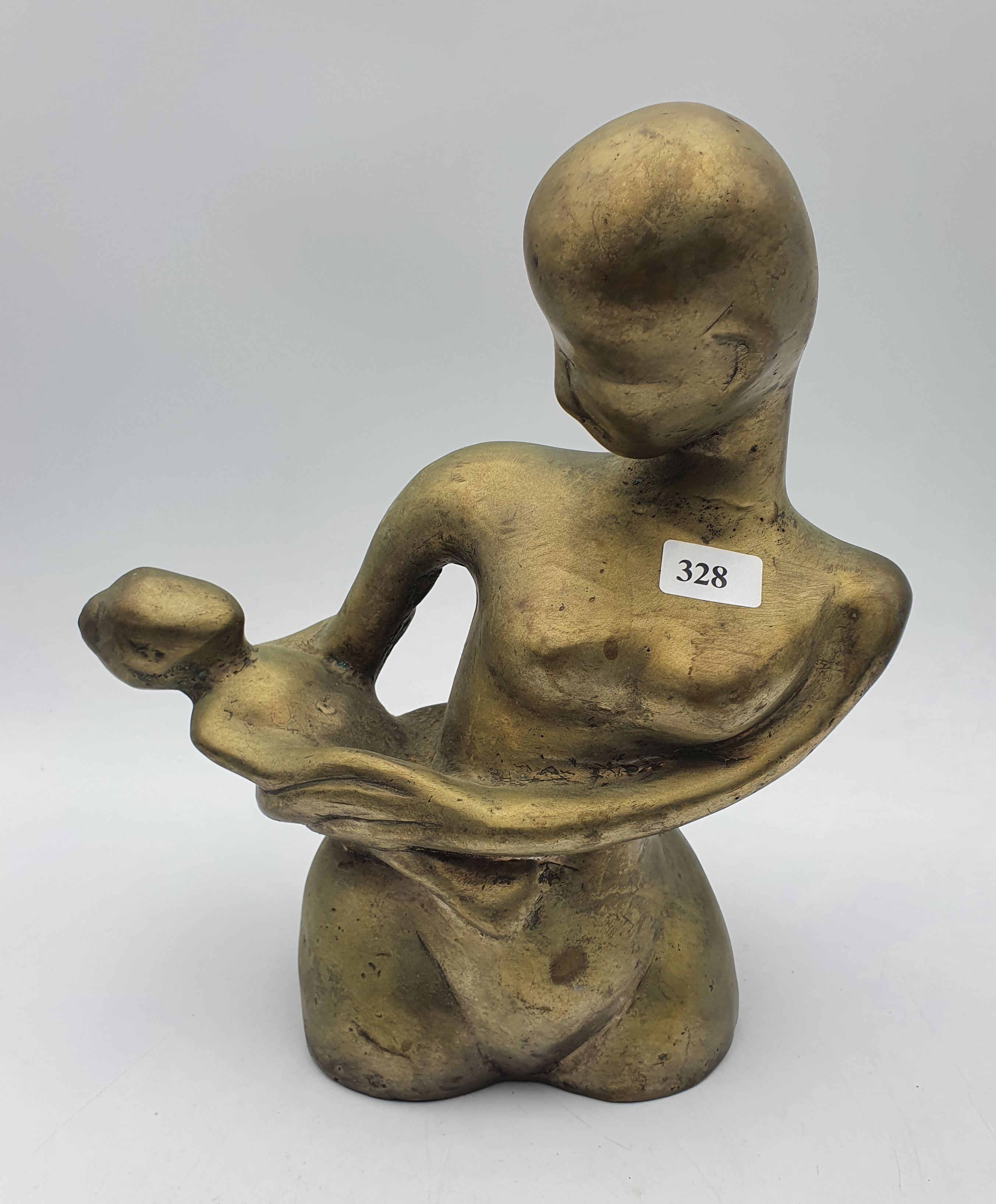 328 · A BRASS STYLISED FIGURE GROUP